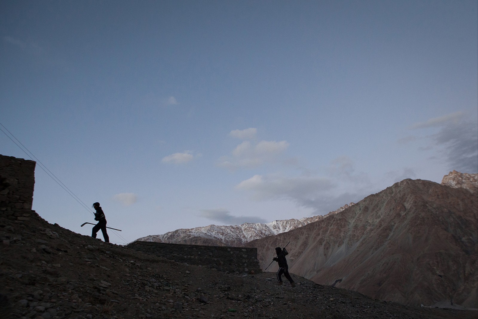 1484412214767 After a long day on the rink the last of the Shyok hockey players make their way back to the village