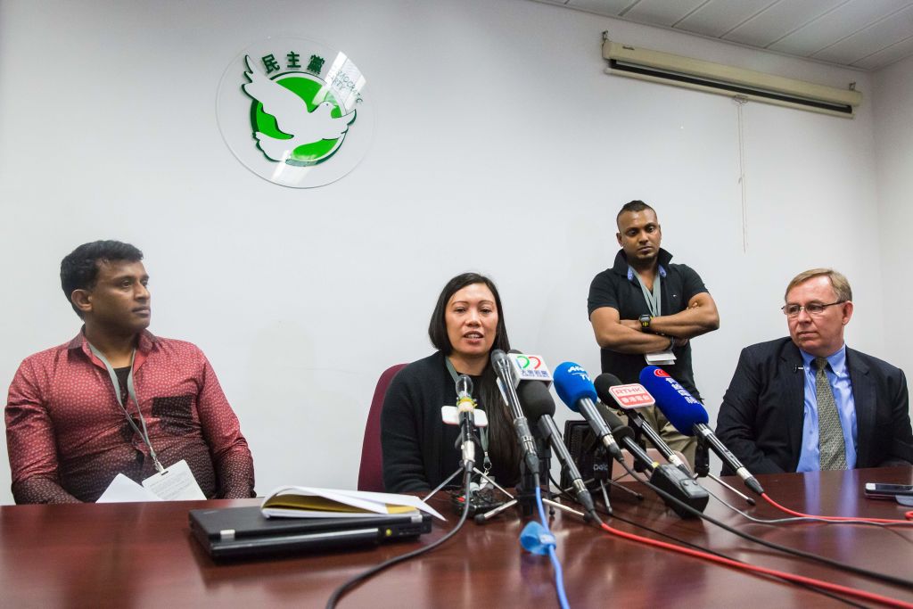 The refugees and their lawyer.