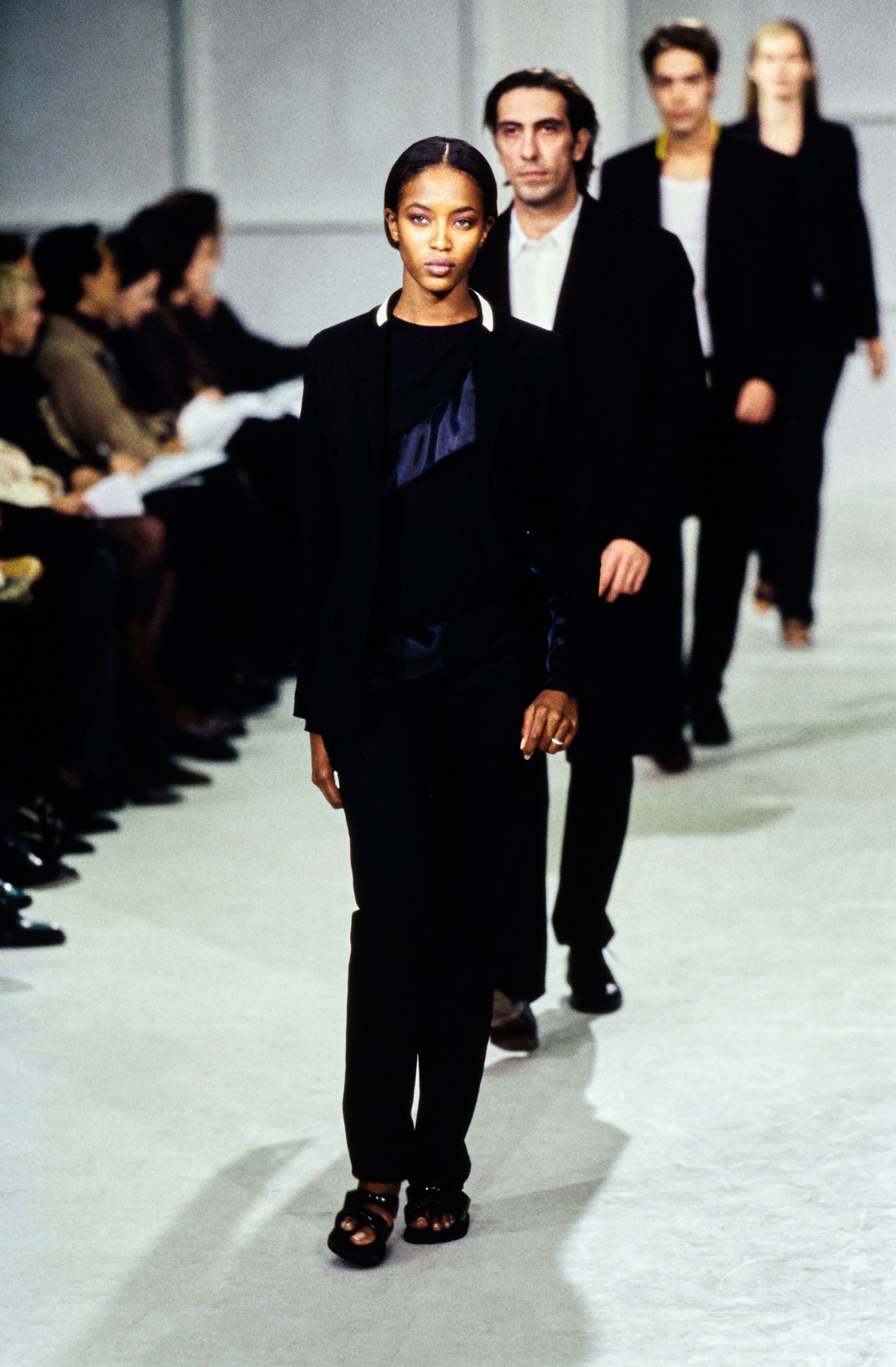 Layered, sheer white tank top in the Helmut Lang Spring/Summer 1999 News  Photo - Getty Images