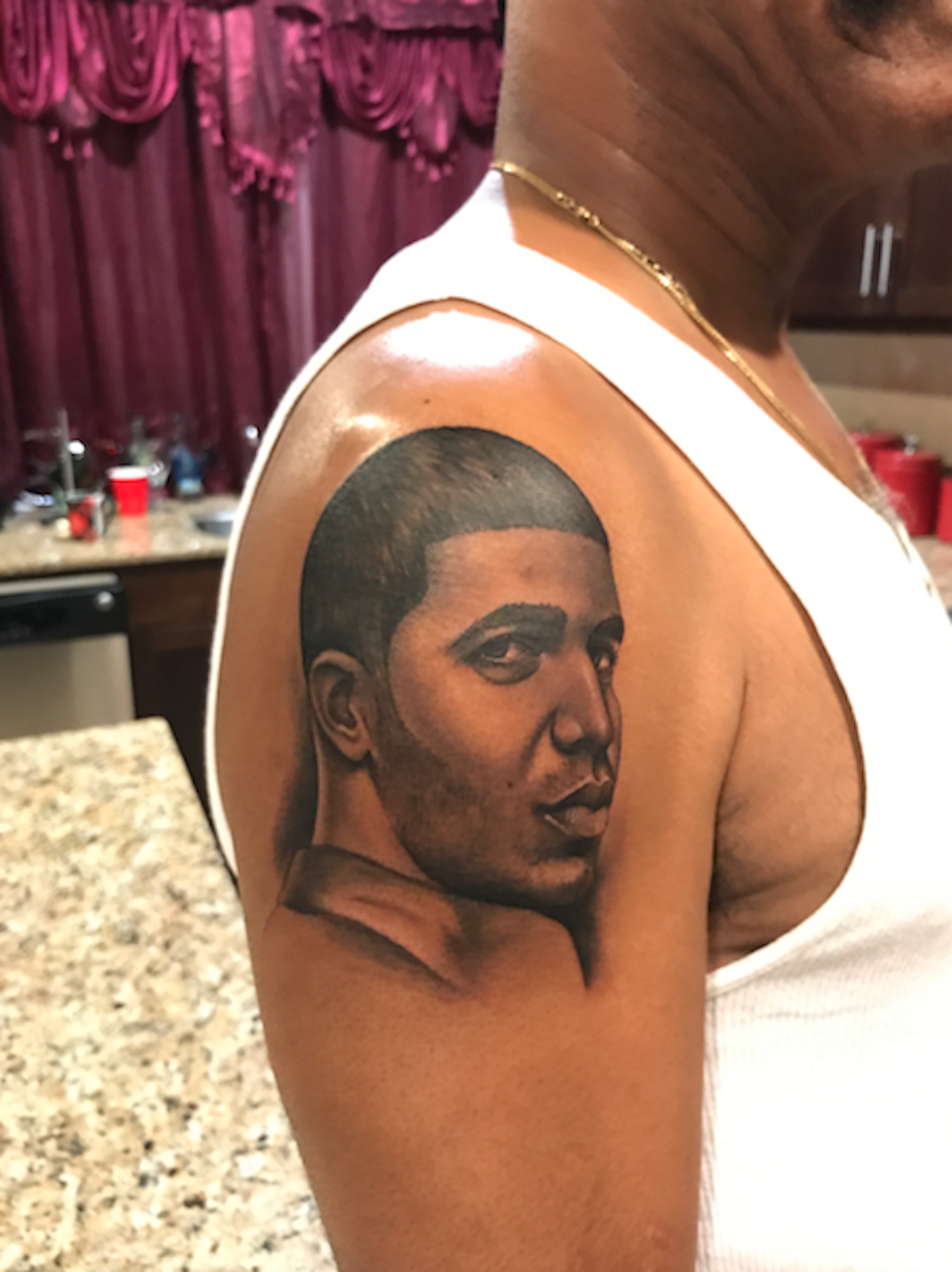 Drake Jokes About Tattoo His Dad Got of His Face Photo
