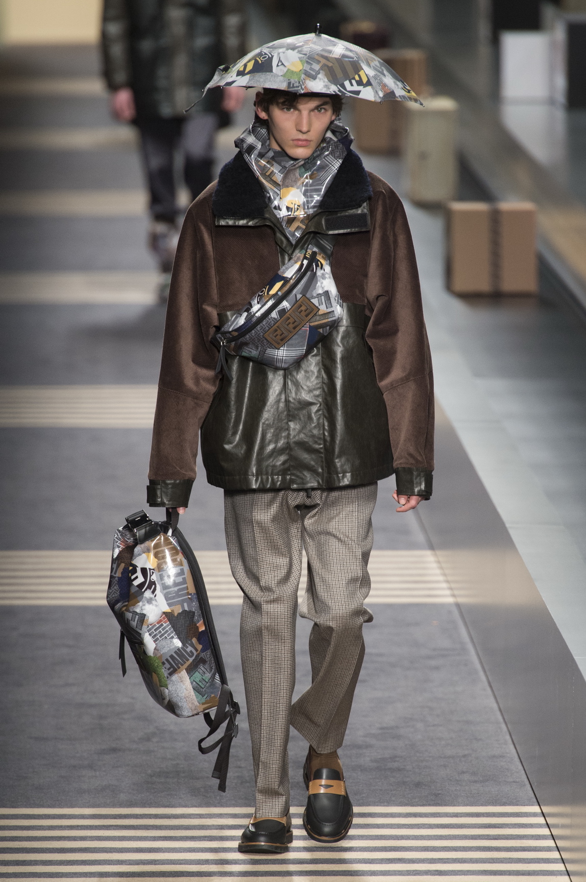 fendi actually showed umbrella hats on the runway at milan fashion week ...