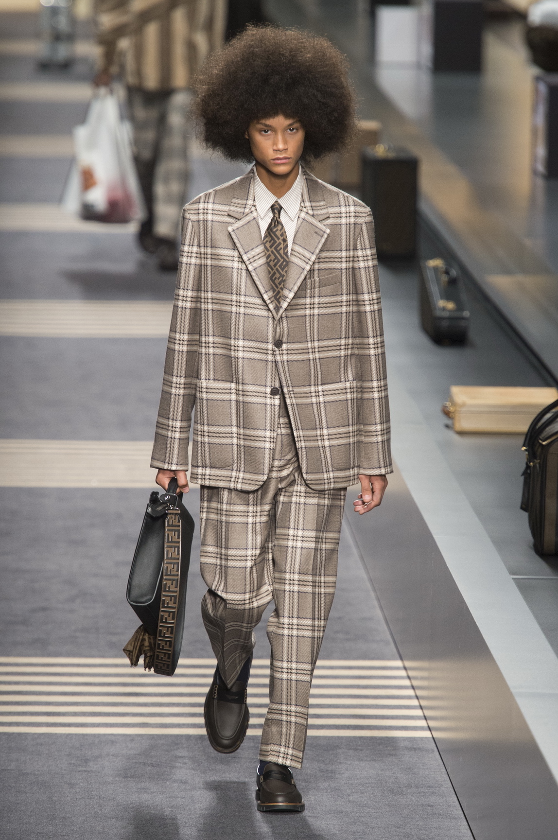 fendi actually showed umbrella hats on the runway at milan fashion week ...