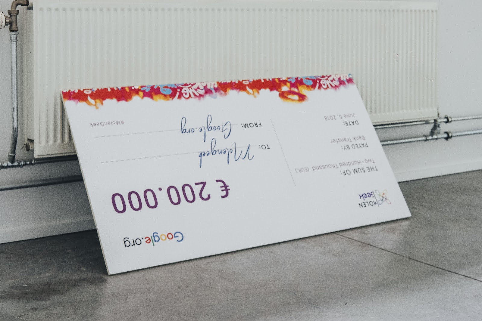 1530912515731-Het-geld-is-er-al-De-cheque-moet-alleen-nog-een-plaats-krijgen
