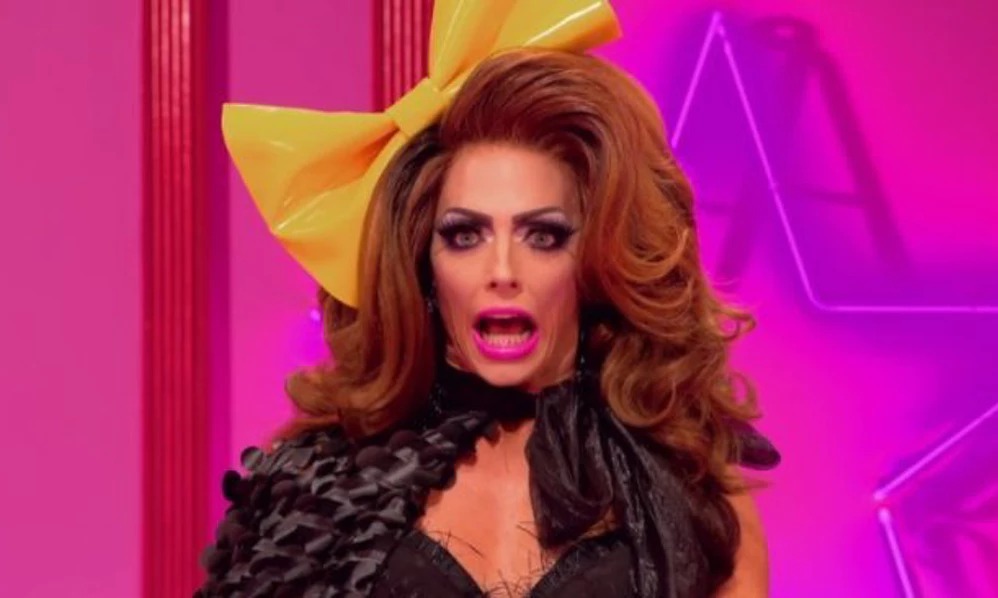 Alyssa Edwards with yello bow in hair on Ru Paul's Drag Race