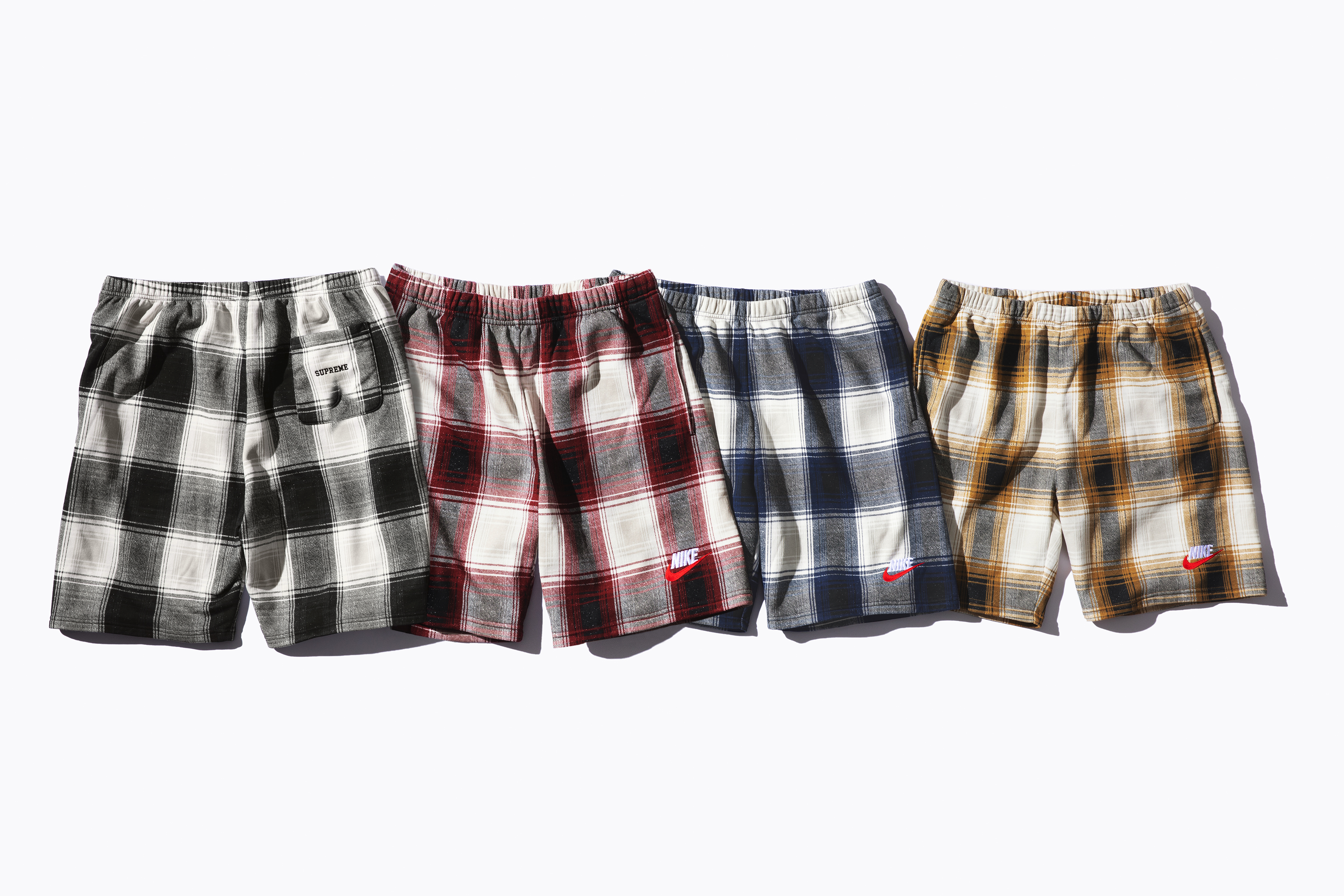 nike supreme plaid shorts