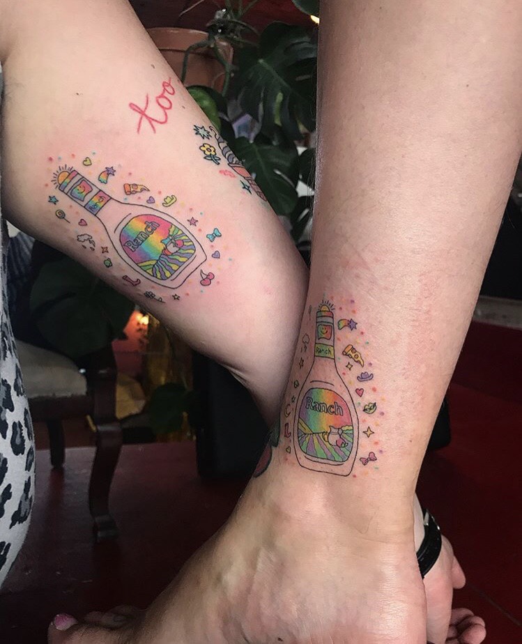 CafeMomcom  Halloween Lisa Frank Tattoo  20 Lisa Frank Tattoos That Are  Full of Rainbows  Animal Print  F  Halloween tattoos Bright tattoos  Pumpkin tattoo