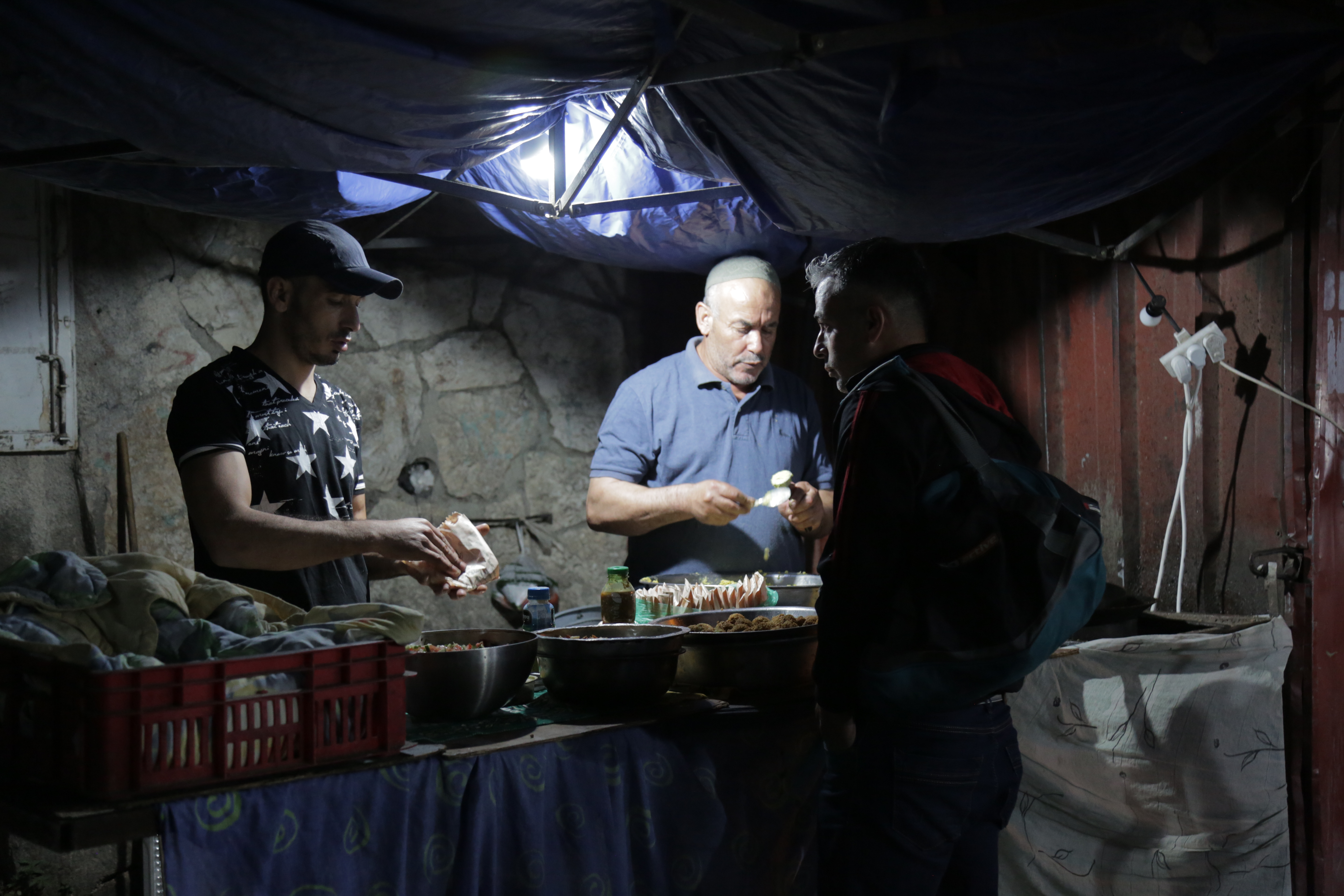 1539176995768-Falafel-shop-at-the-checkpoint-photos-by_-Alaa-Daragmeh