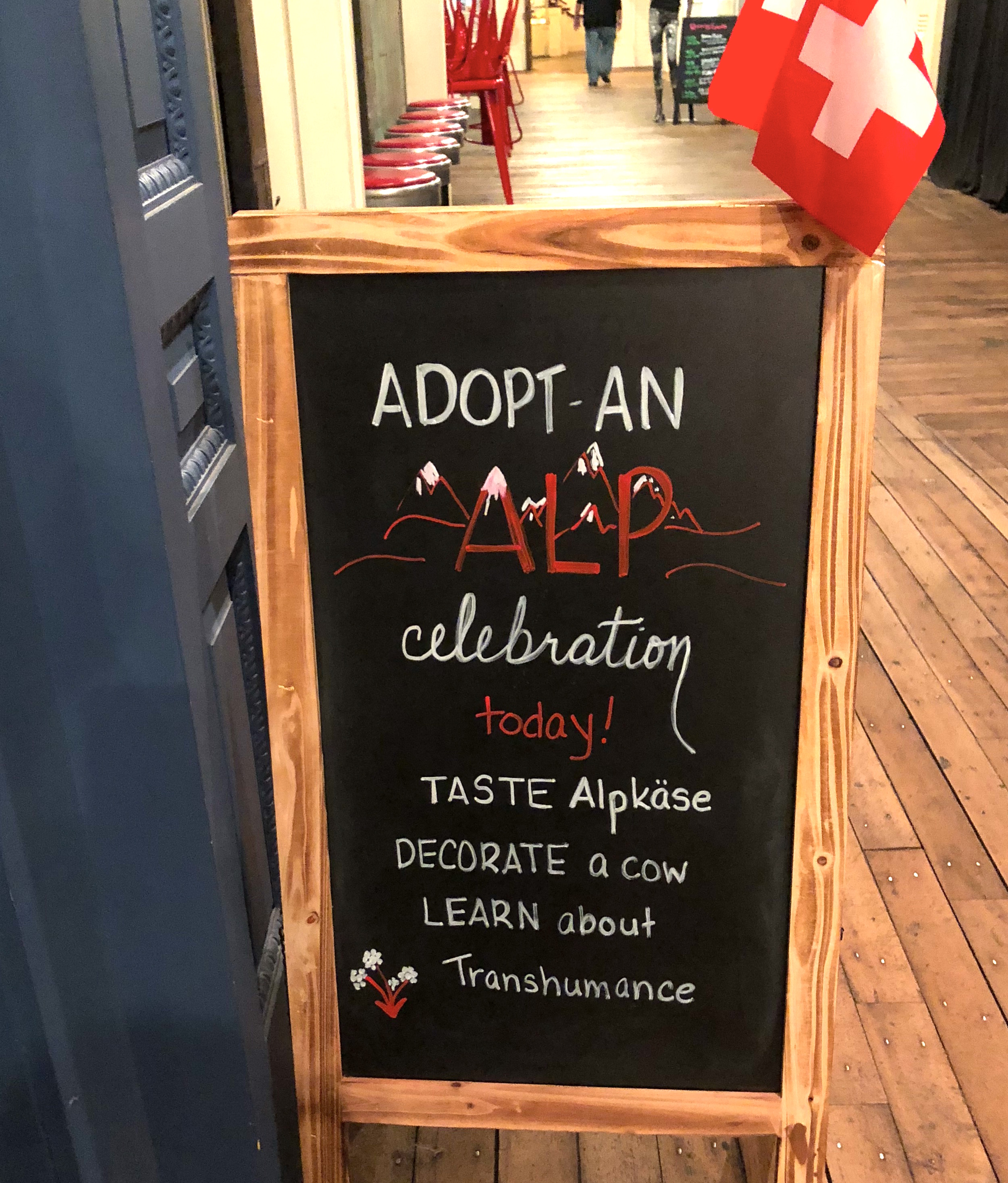 1539895699057-AdoptanAlp-Sandwich-Board