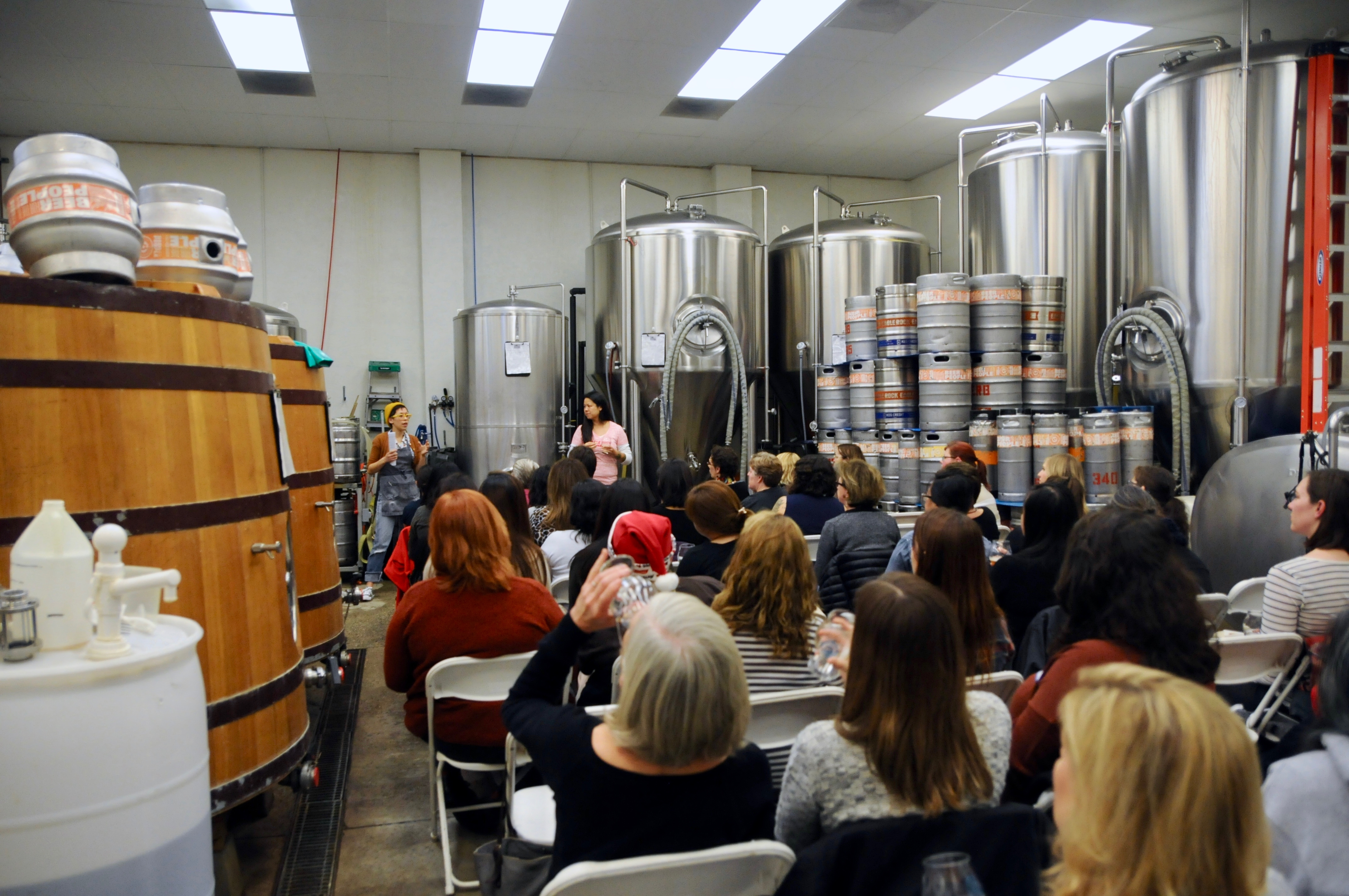 A group of women in a brewery.
