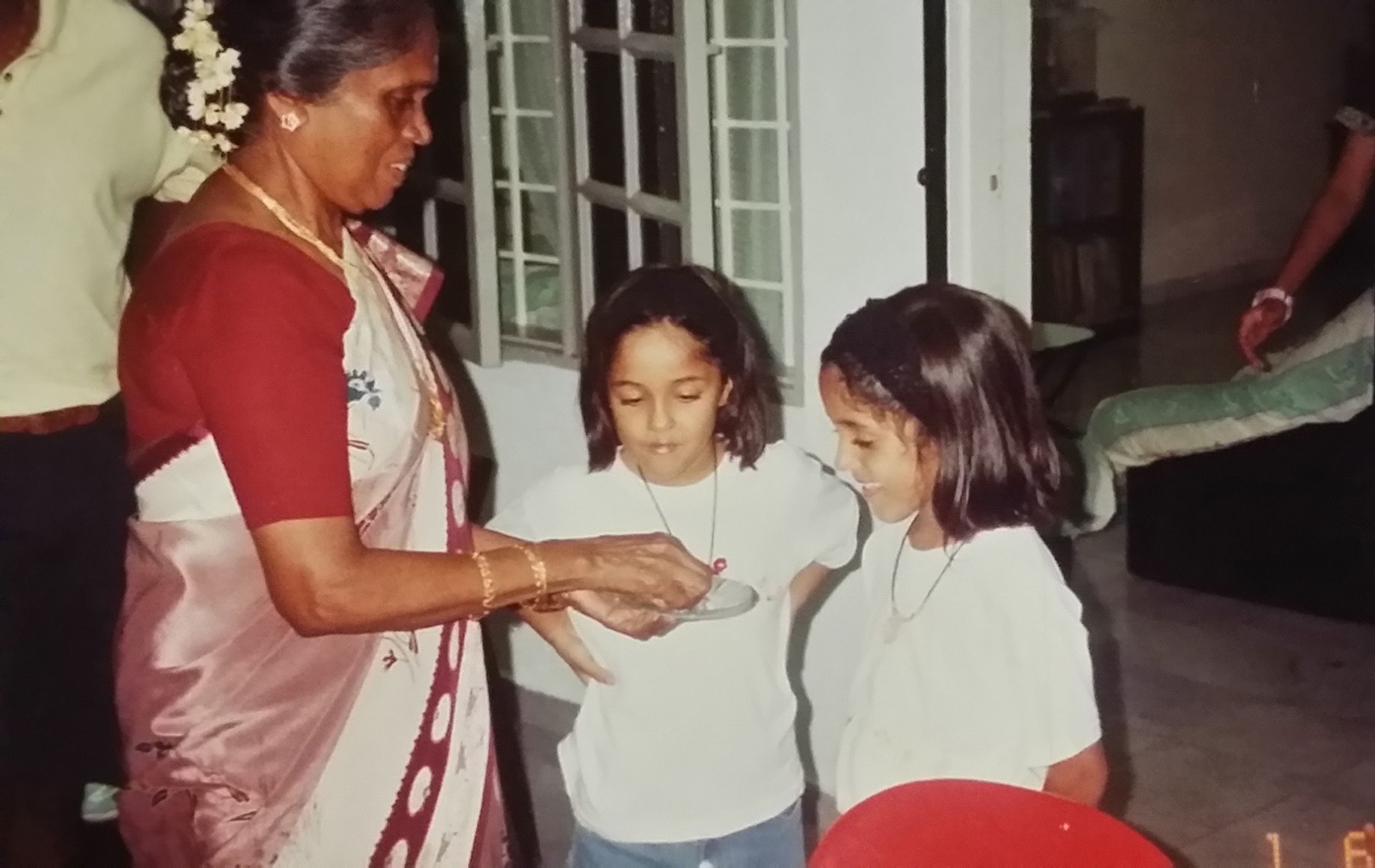 1540376473470-With-our-muthi-grandma-in-Malaysia