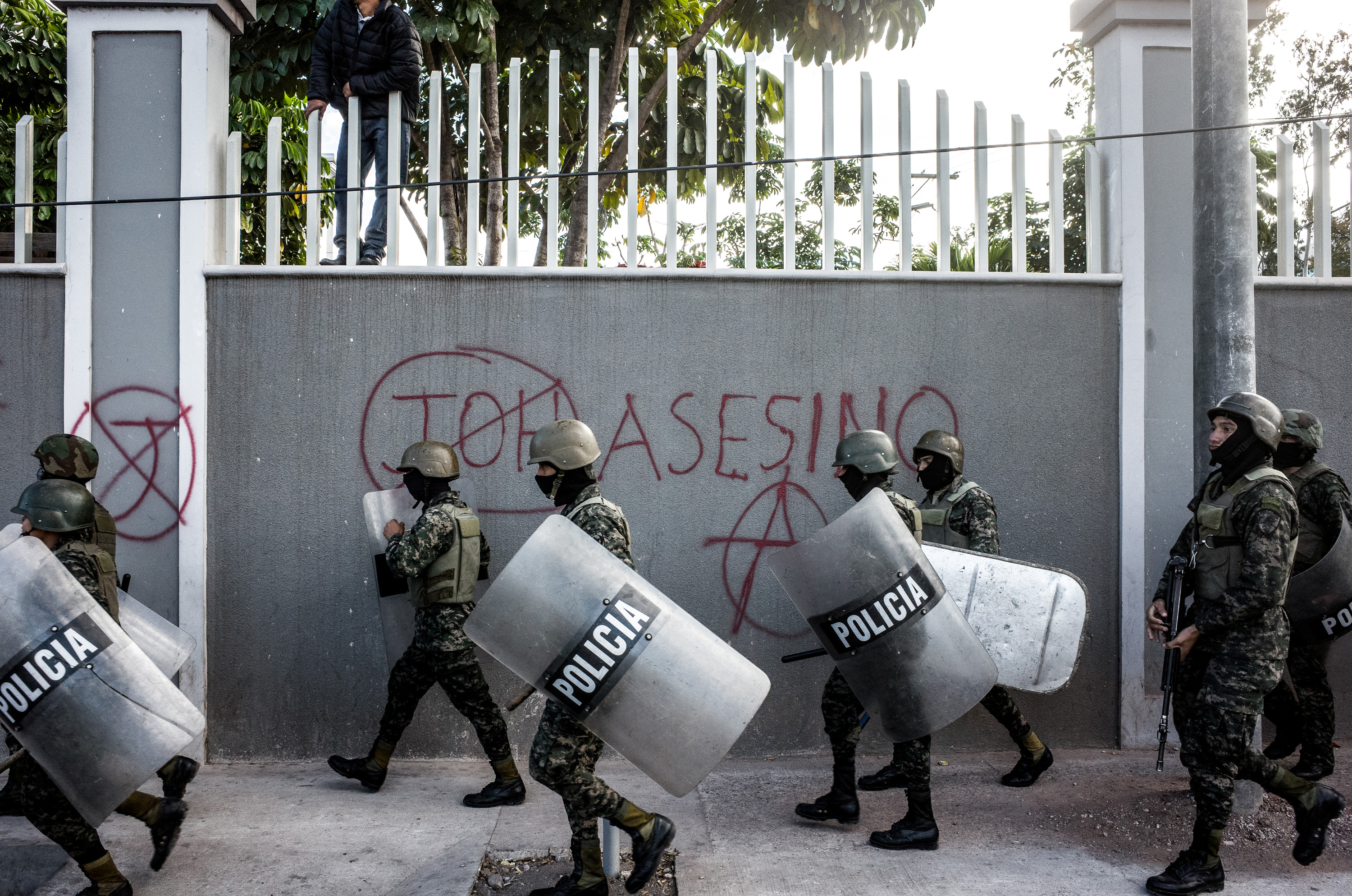Honduran police officers in riot gear.