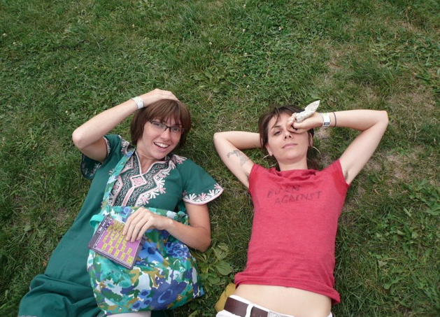 jessica hopper and friend circa 2007 in the grass at a TVOTR show