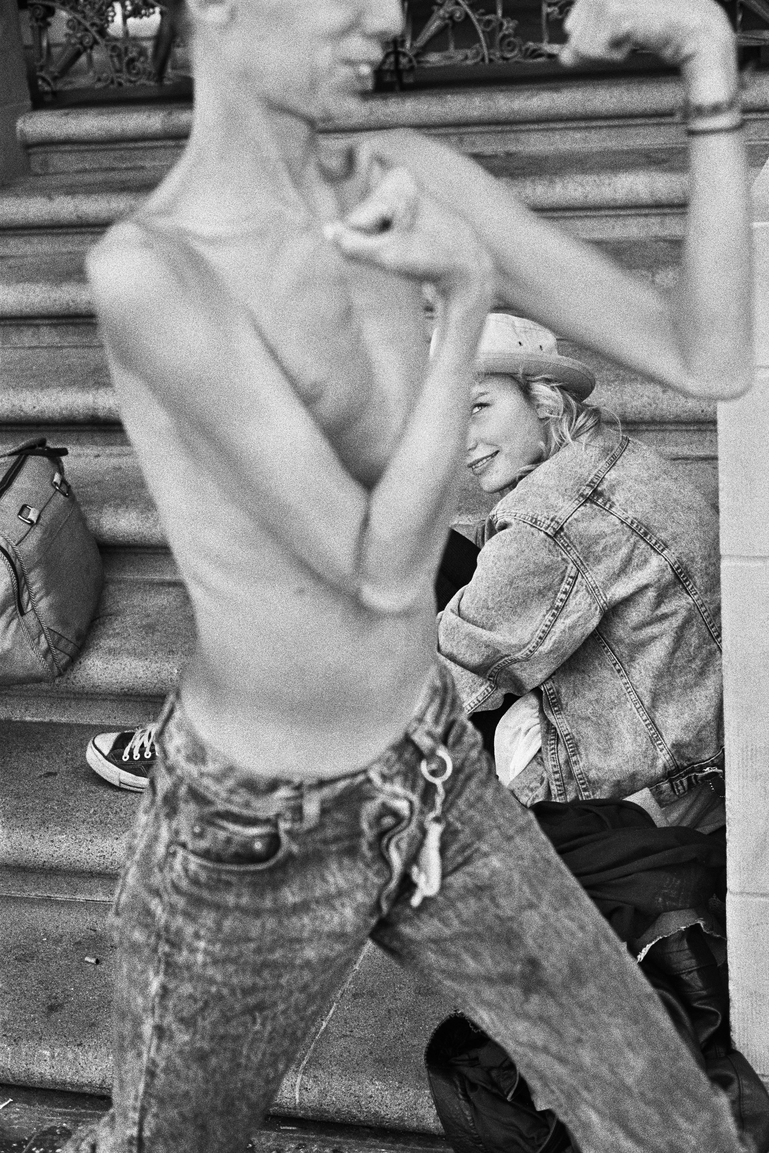 Dave Making Muscles for Heather. From the series, “Raised by Wolves.” Hollywood, California. 1988. © Jim Goldberg / Magnum Photos