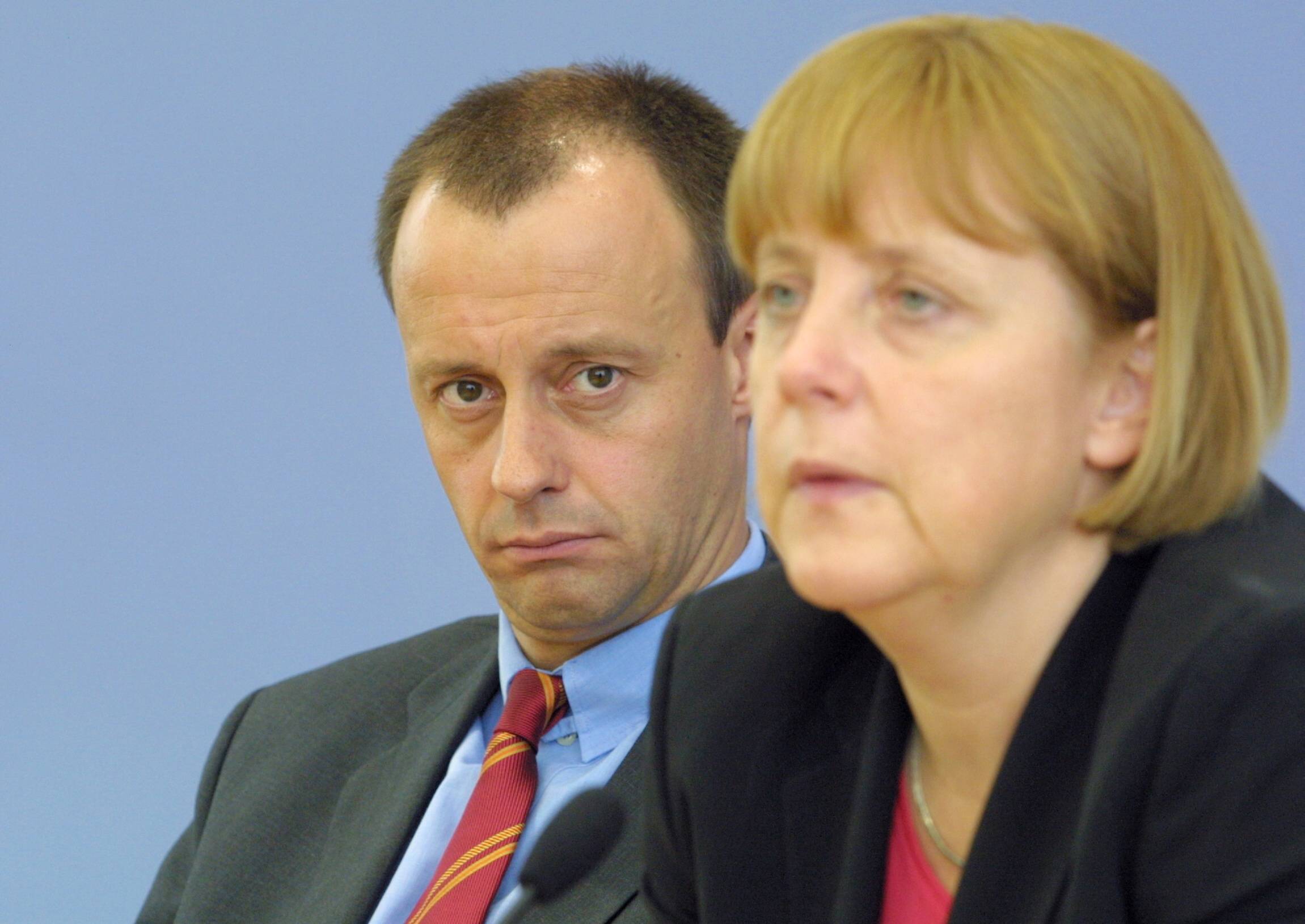 Friedrich Merz und Angela Merkel