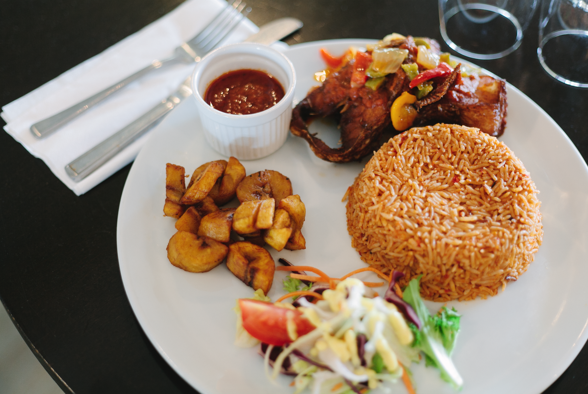 1541084318151-Plantain_Jollof_FriedFish_805Restaurant