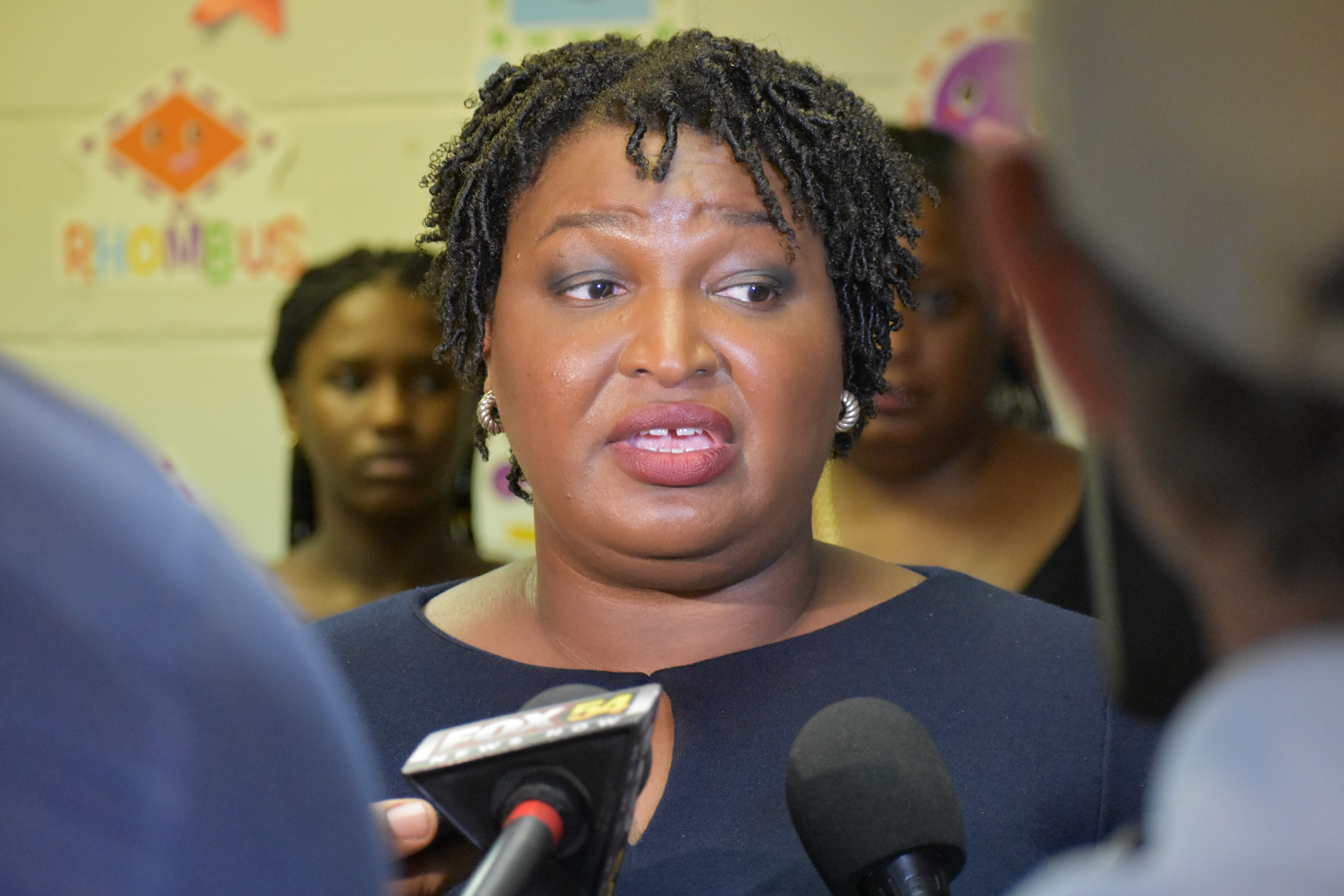 Stacey Abrams takes questions from reporters.