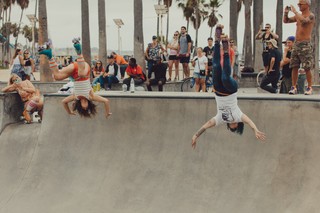 Michelle and Vanna doing a backflip in the bowl