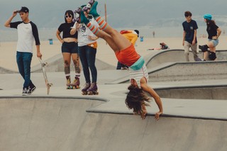 Michelle doing a handstand at the edge of the bowl