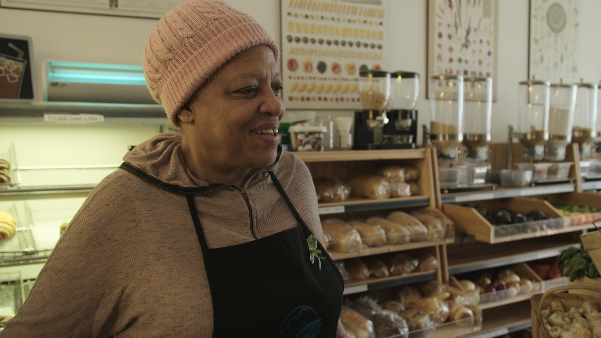 1544041511042-Opal-volunteer-at-pay-what-you-can-grocery-store