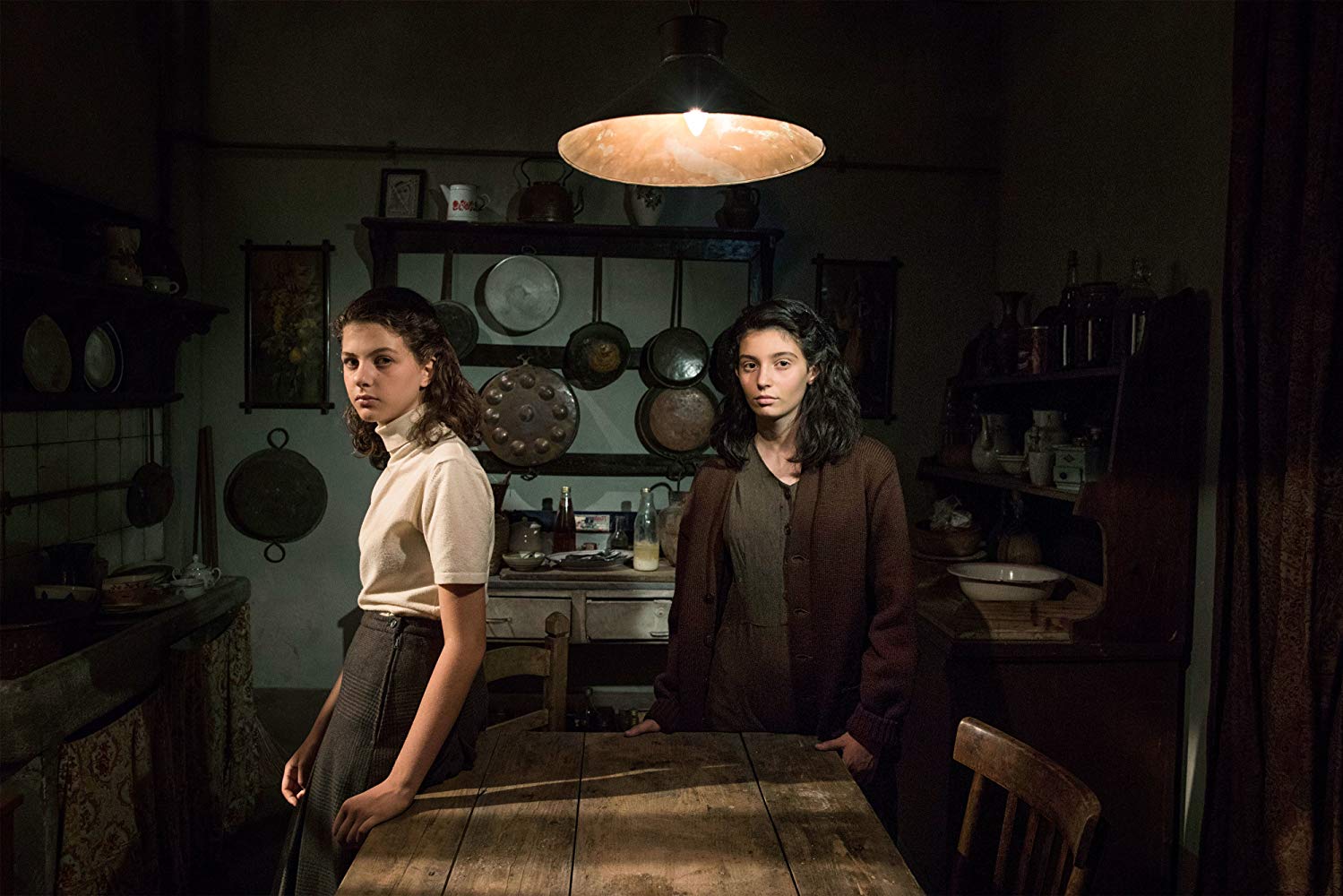 Lila and Elena, teenage age, in the kitchen