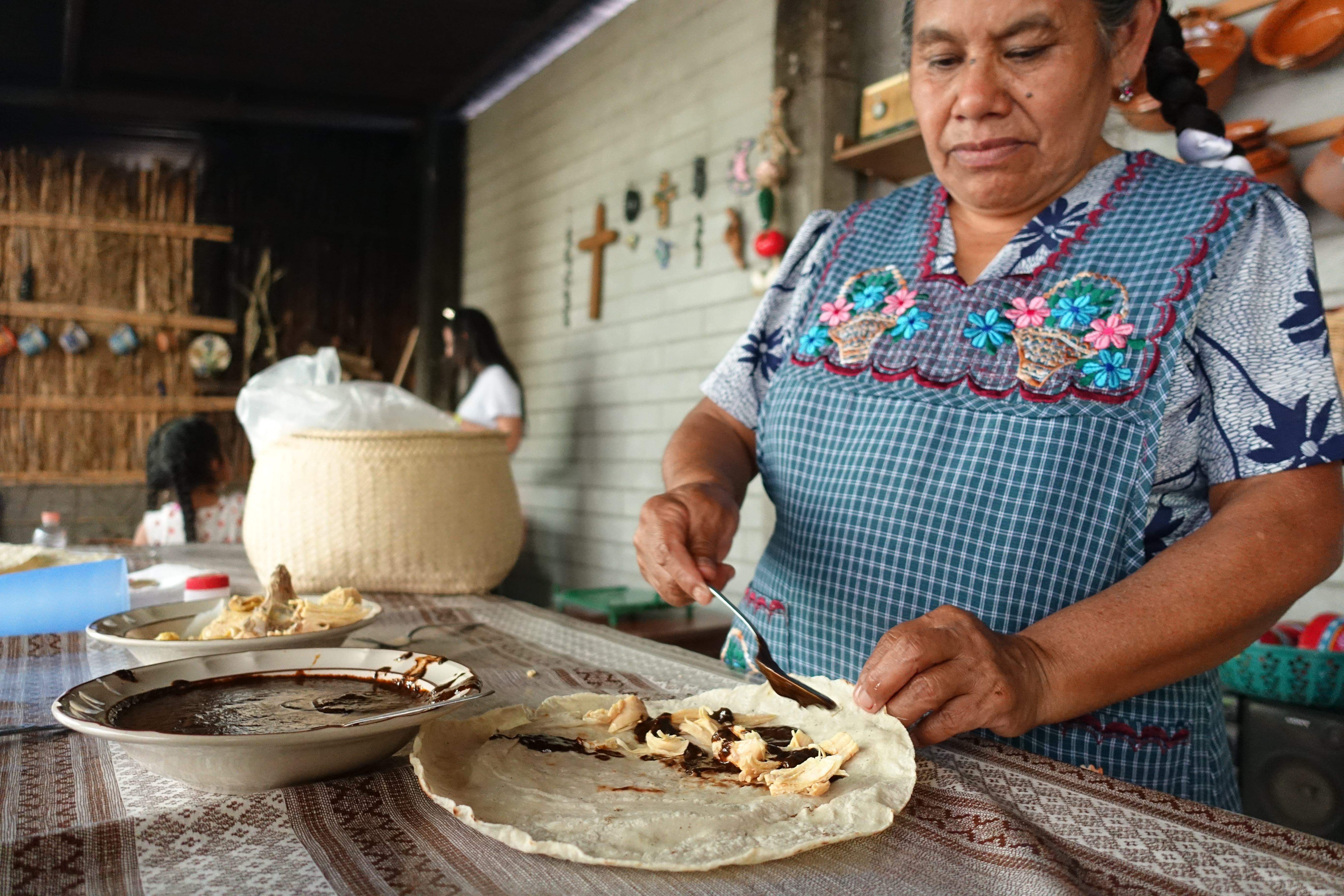 Chicken mole tacos served at the Navarro Sisters artisan textile workshop in Santo Tomas Jalieza