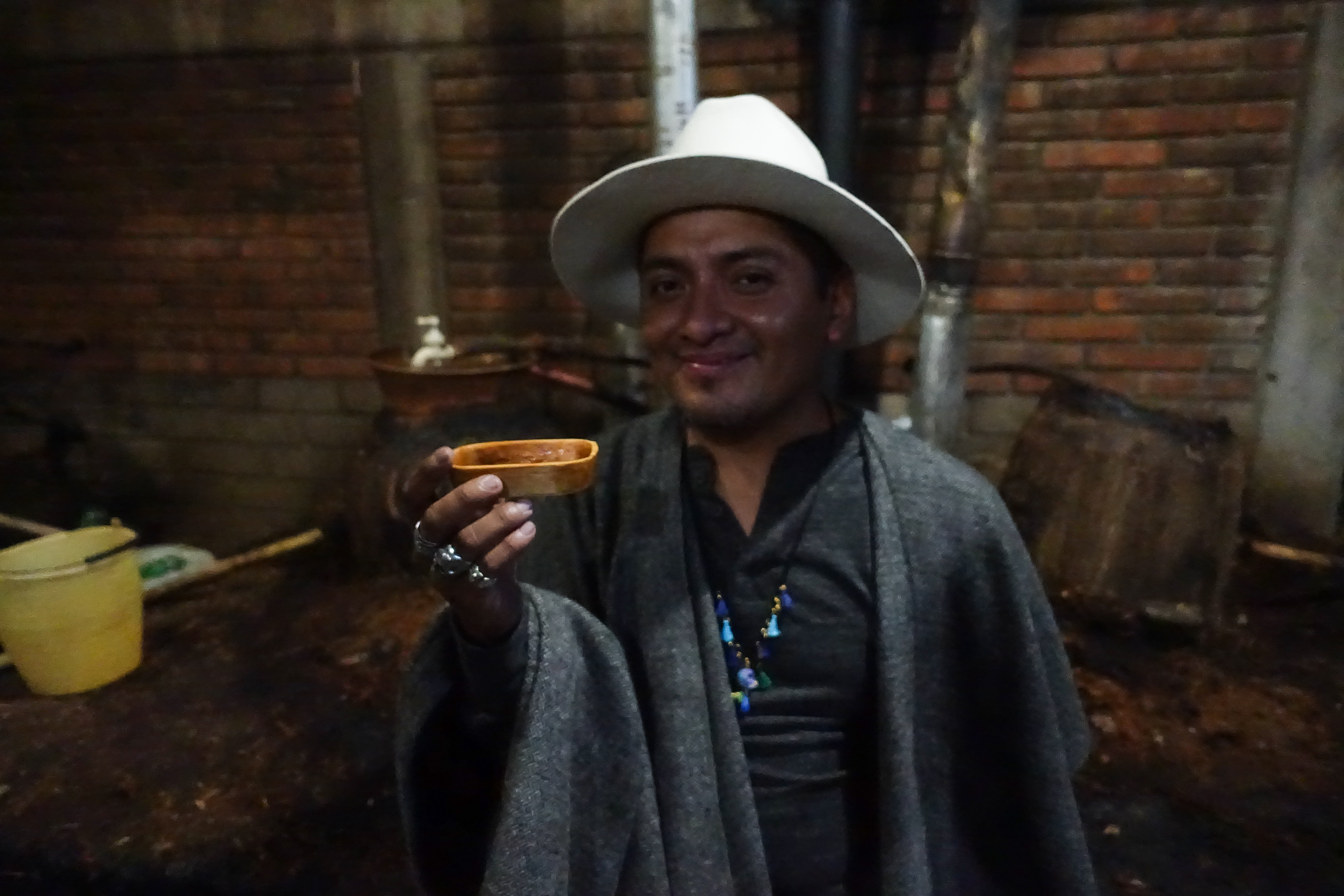 Alonso drinks from a traditional gord cup.