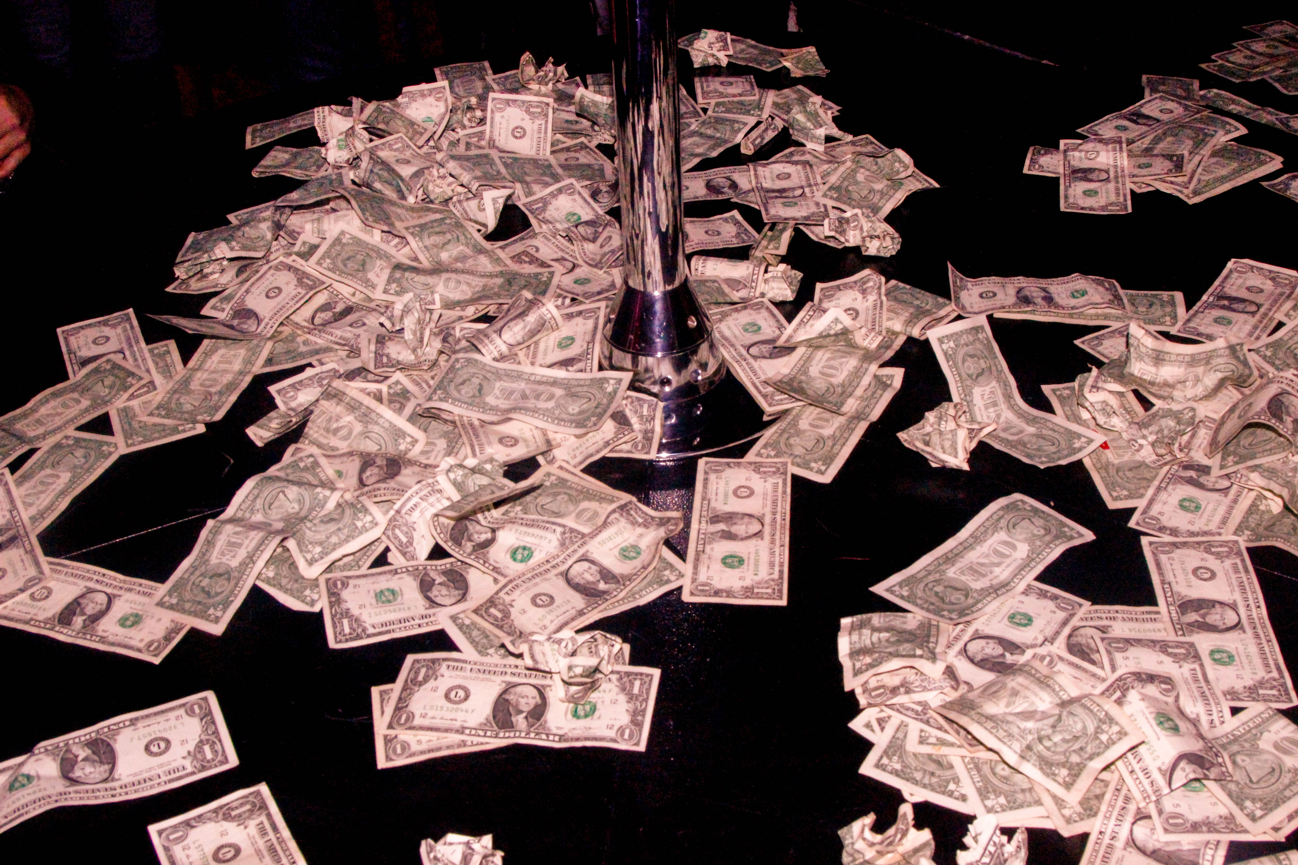 dollar bills on a floor