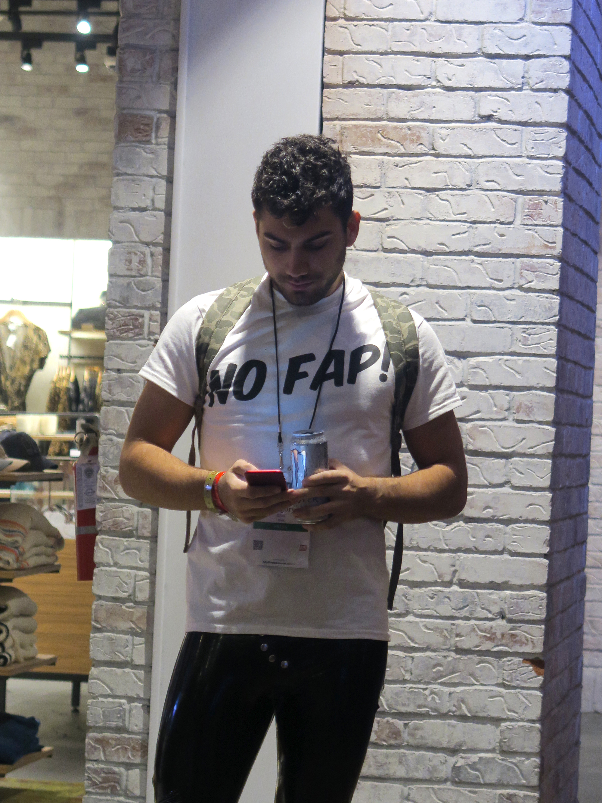 A man wearing a shirt that reads