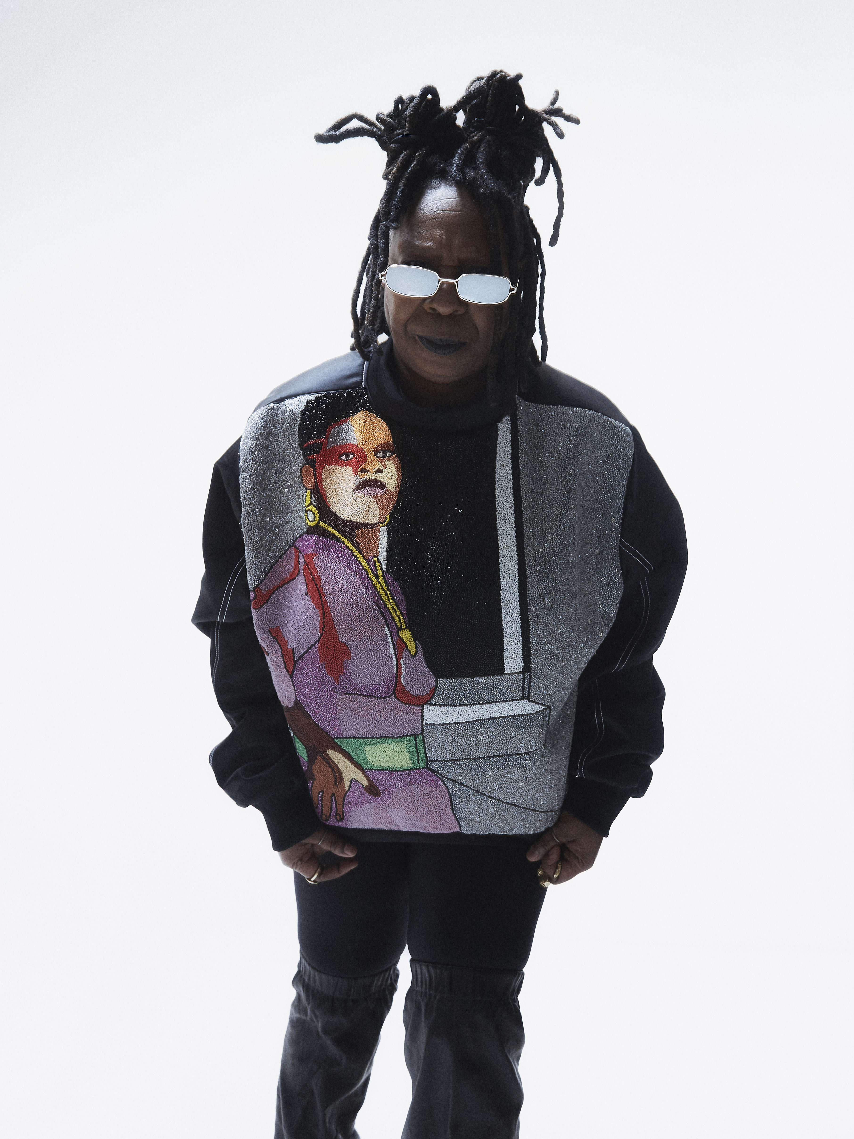 Jacket by PYER MOSS (worn backwards), sunglasses by BONNIE CLYDE.
