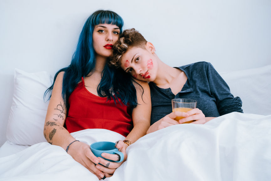 Two queer women in bed