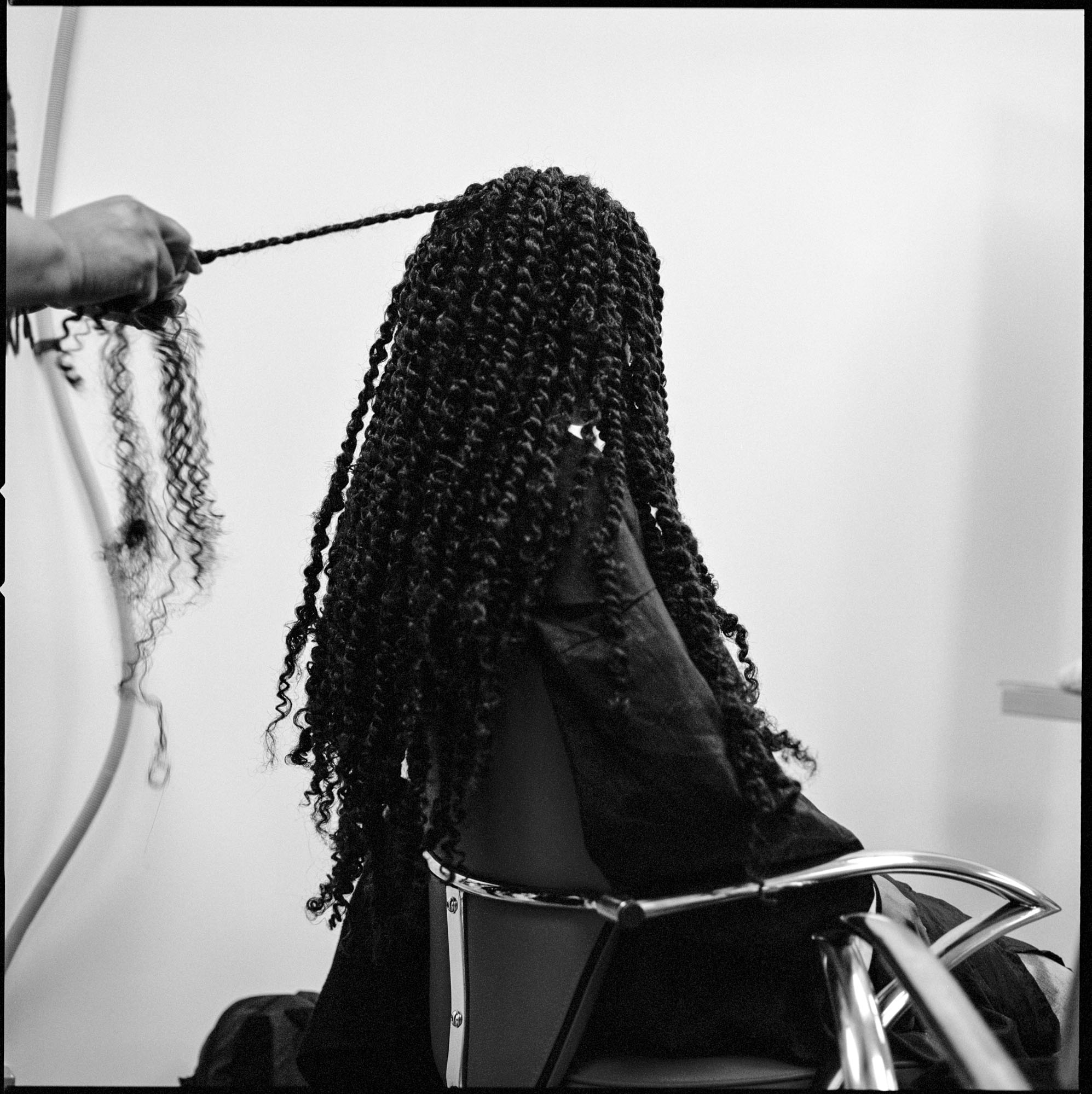 Peckham Palms customer in a salon chair