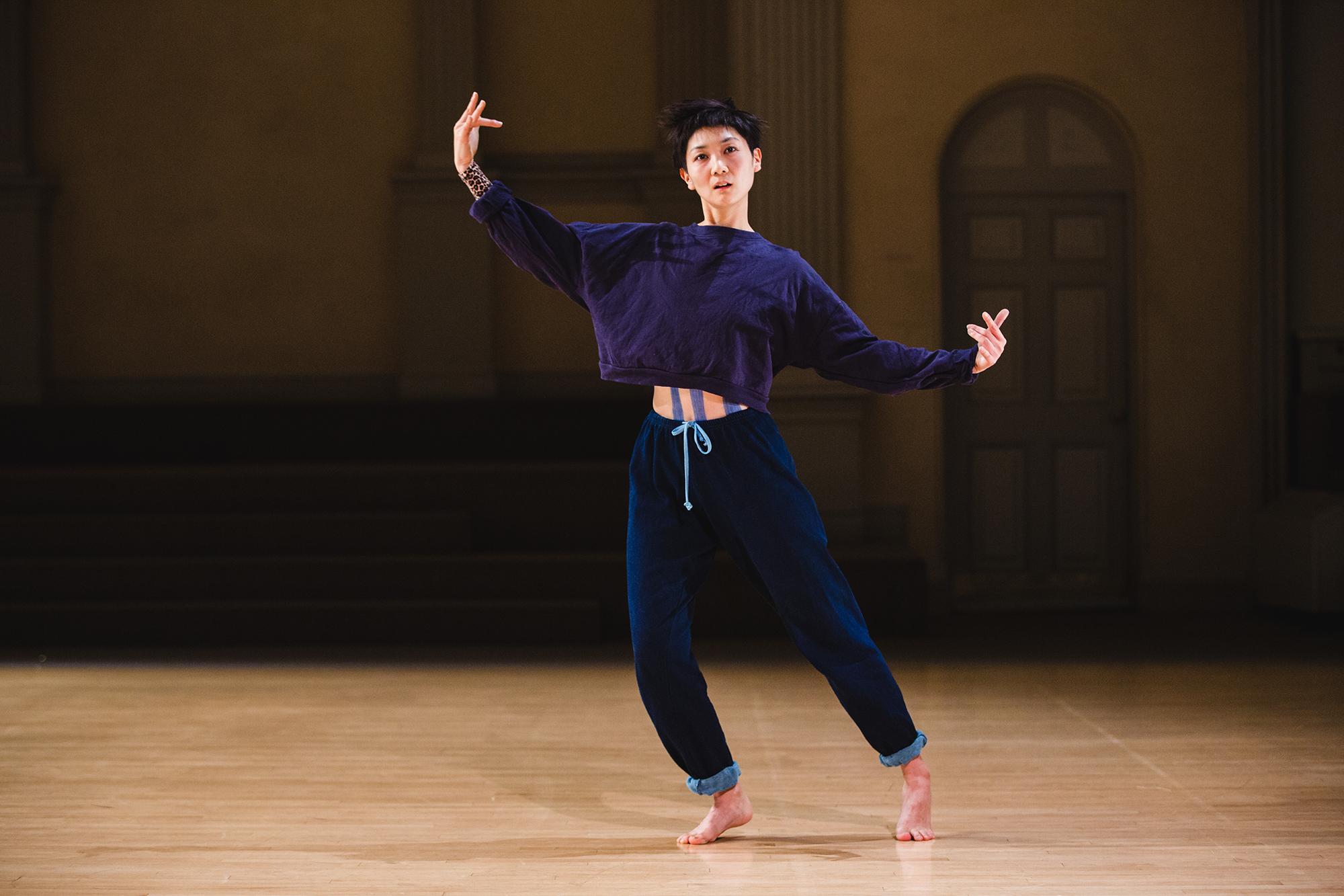 Mina Nishimura mimics Graham’s “sinking body” in her performance of ‘I’m either a Psychopath in a Sheep Clothing, an Intern Priest At The St. Marks Temple, a Temporary Assistant to the Visual Artist, or You’; photo by David Gonsier.