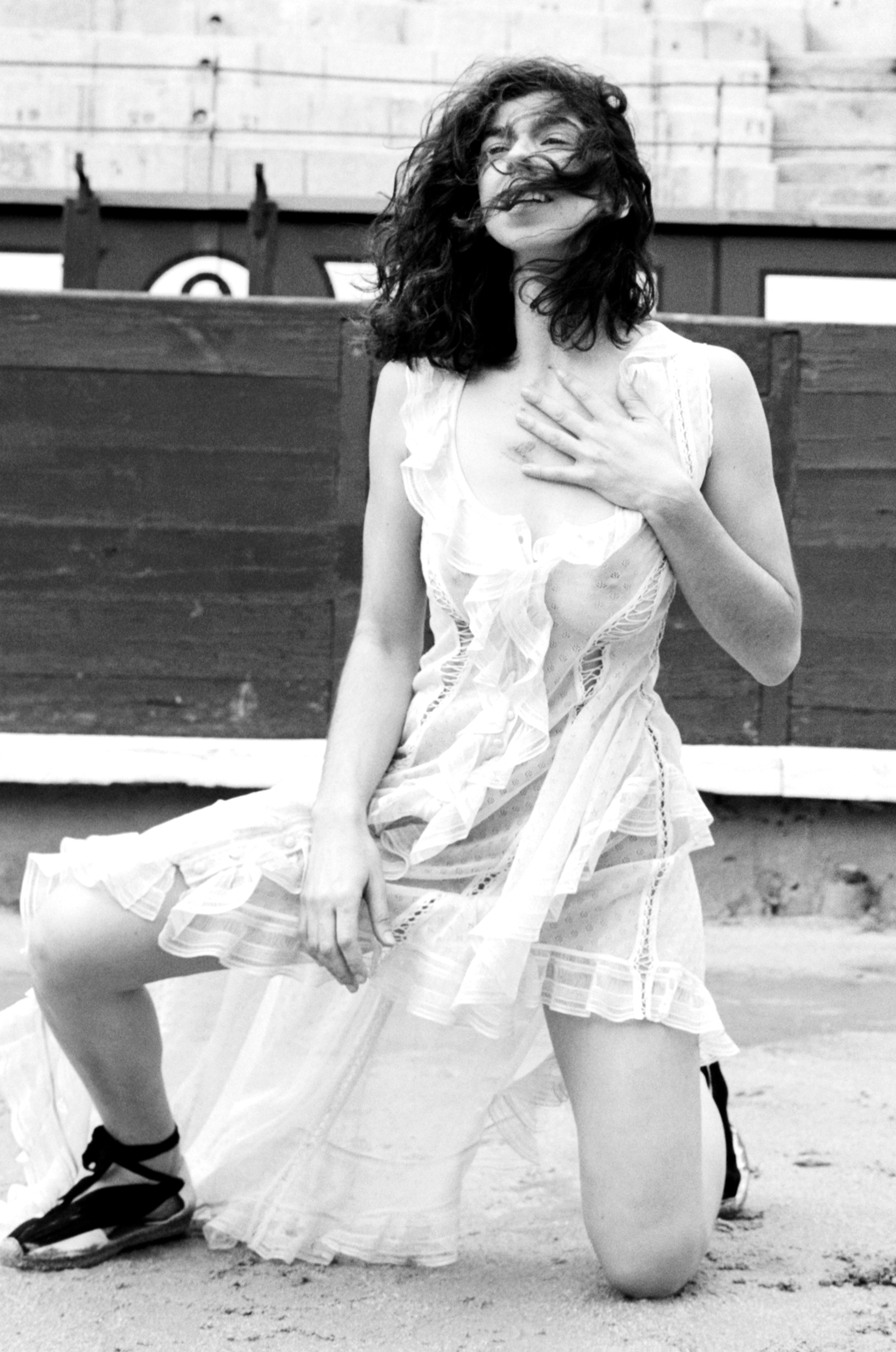 Julia de Castro wears dress by ALEXANDER MCQUEEN.