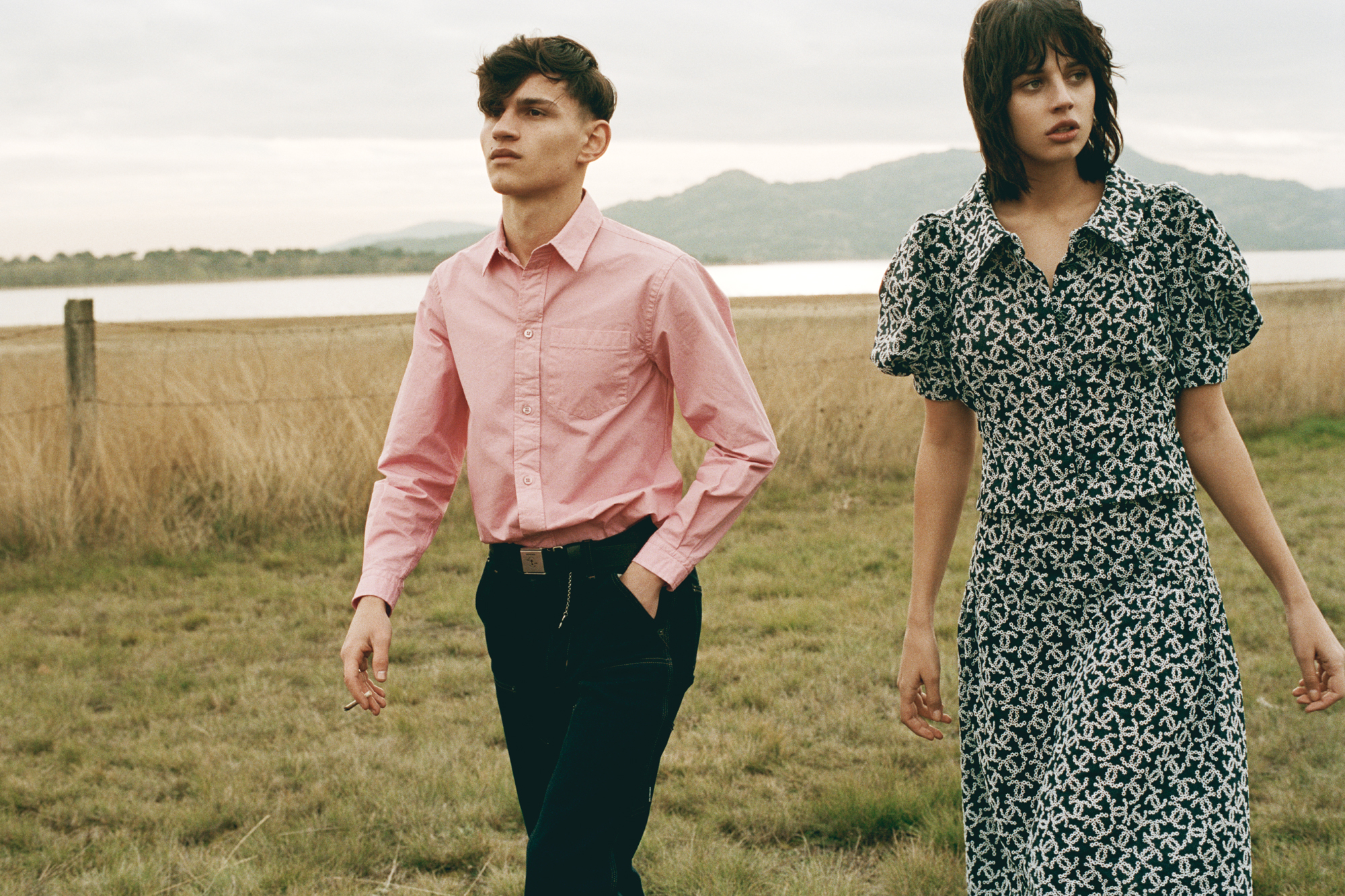 Cristian Vitos (left) wears BALENCIAGA, Yasmina Paiman (right) wears top and skirt by CHANEL.
