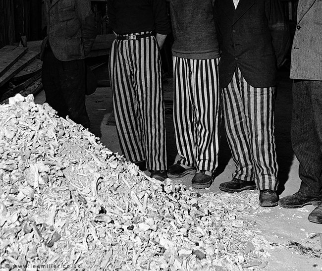 1551958539884-Released_prisoners_in_striped_prison_dress