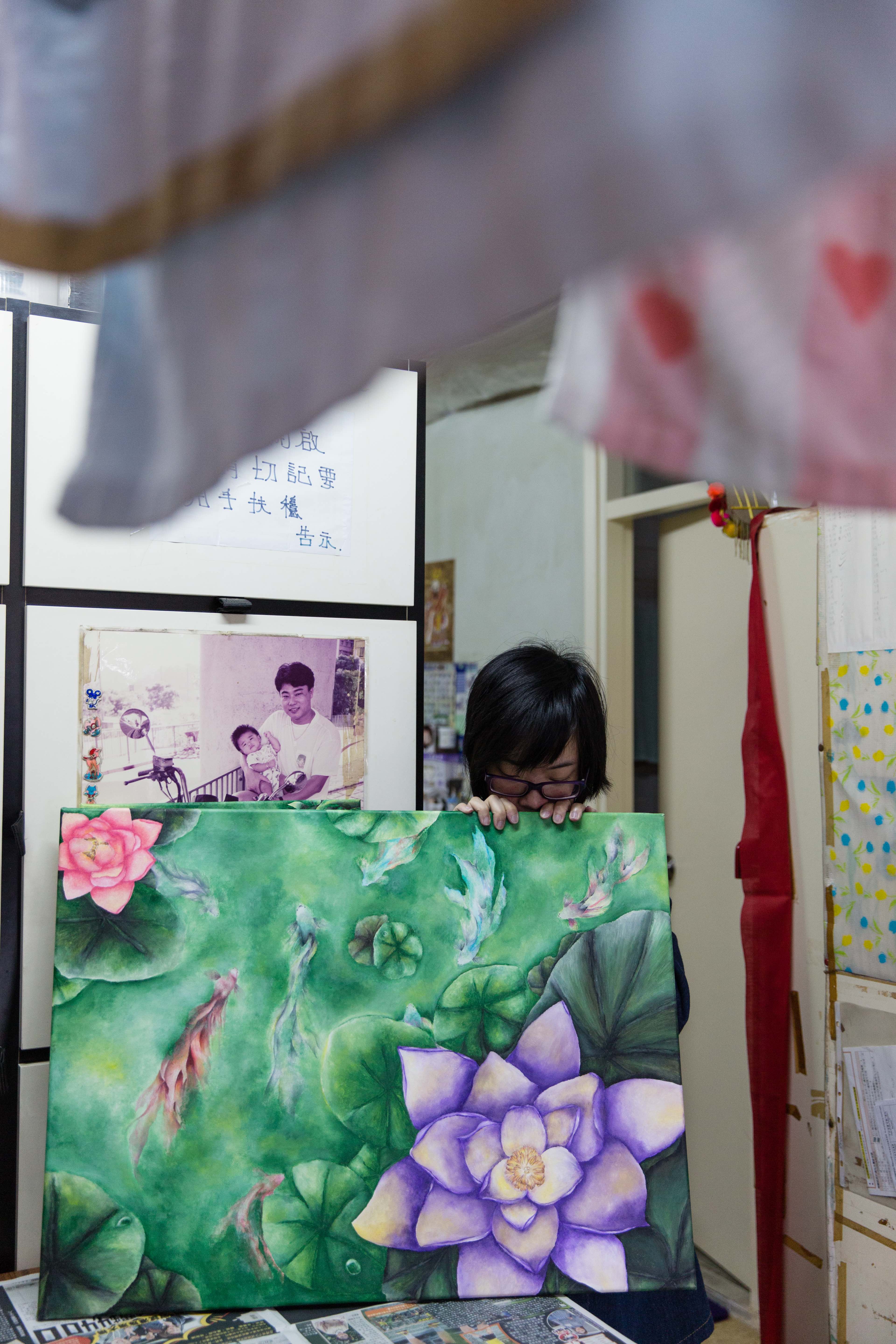 Tung with her art.