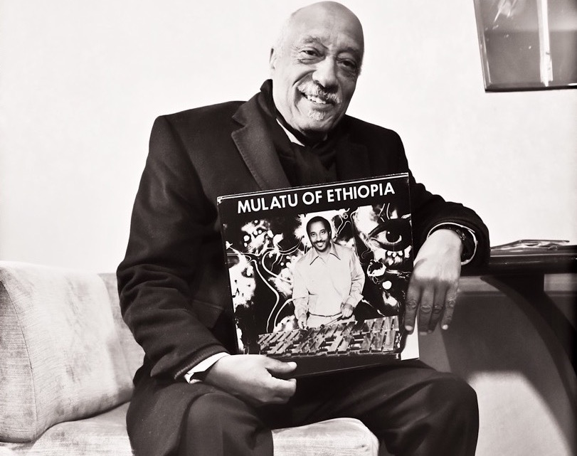1554395384552-Mulatu-Astatke-with-vinyl
