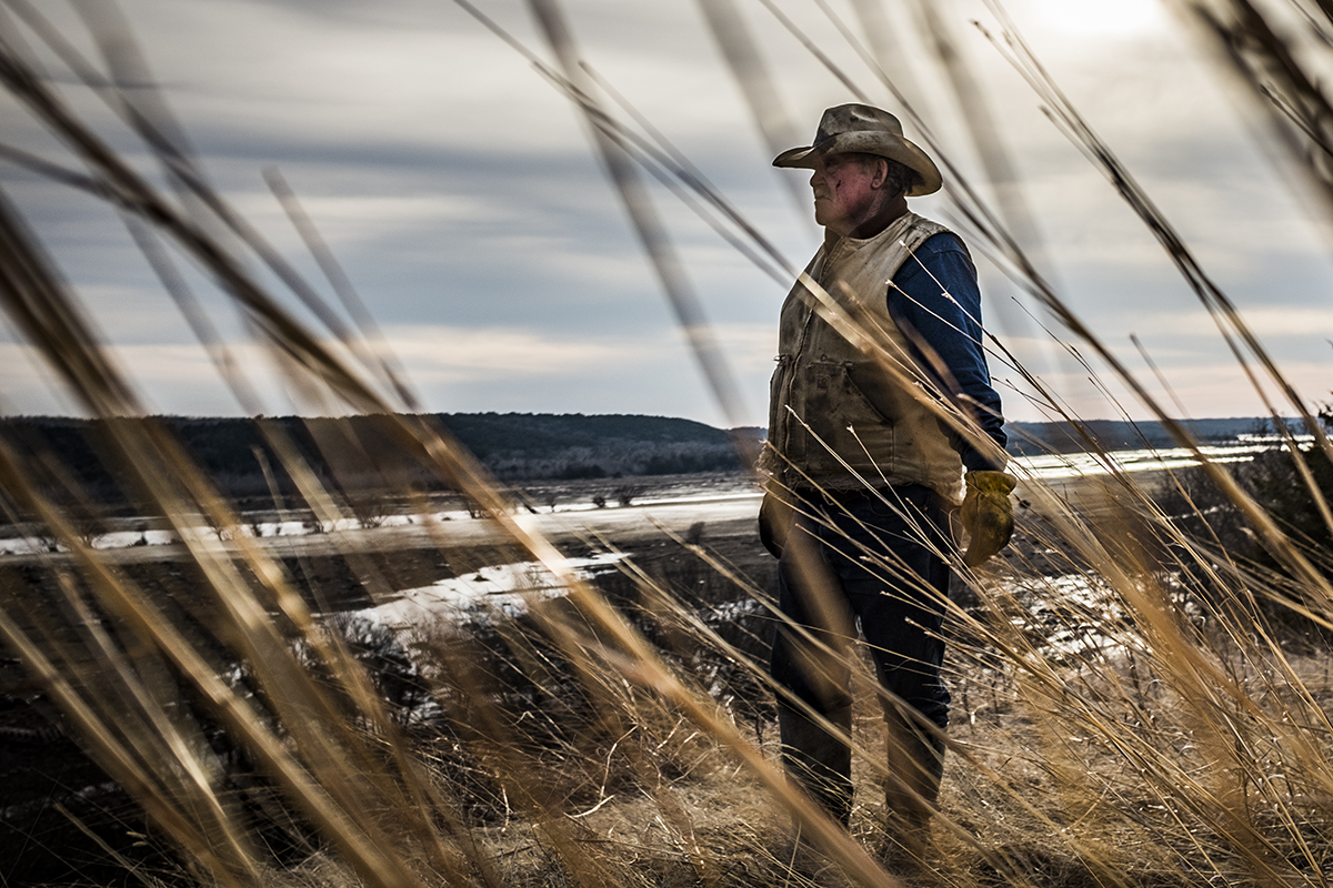 Paul Allen, 75, looks at the damage caused to his cattle ranch by floods after a dam collapsed about 4 miles away on the Niobrara River in the early hours of March 14. (Jika Gonzales/VICE News.)
