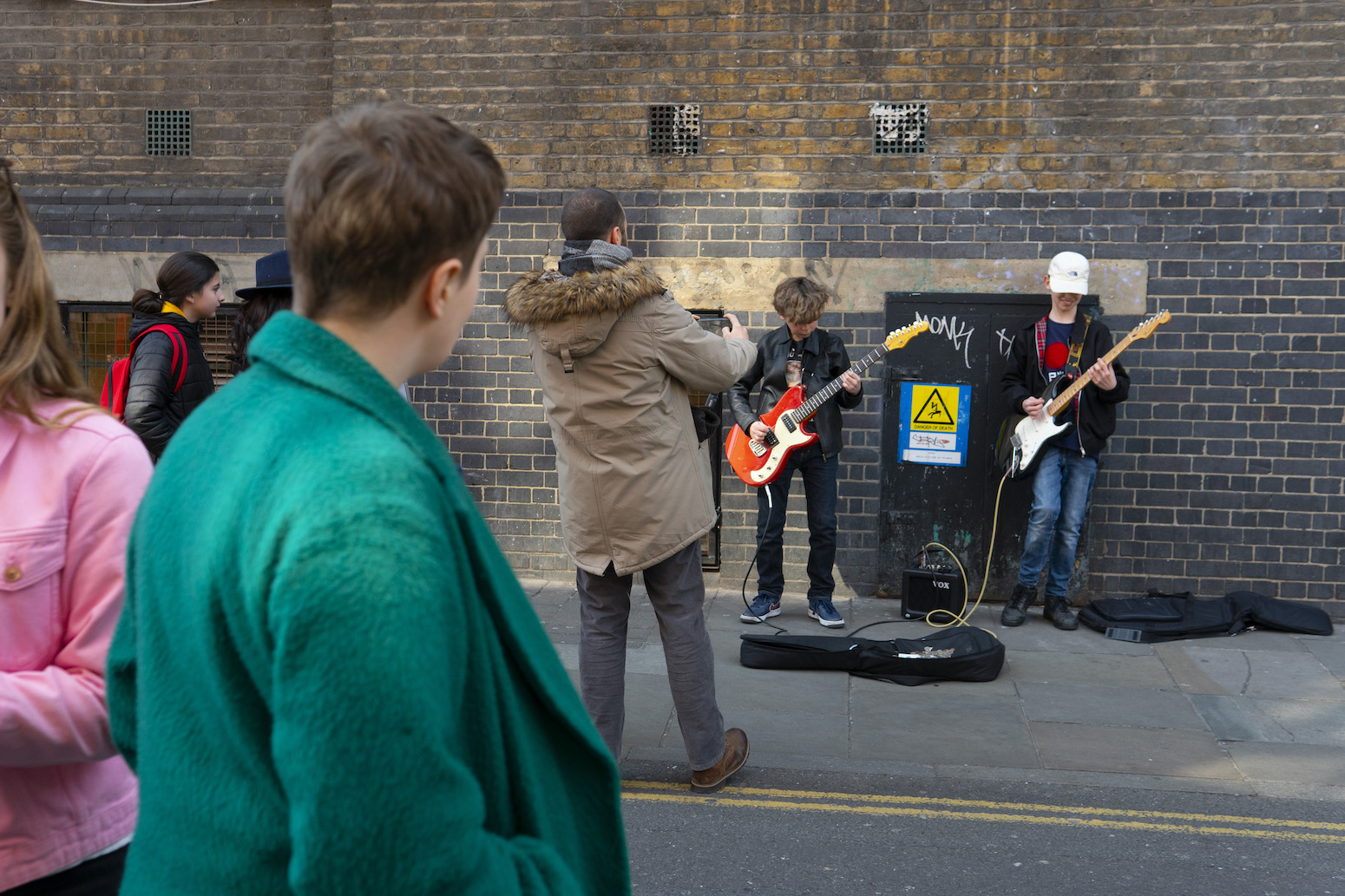 watching buskers on brick lane for noisey