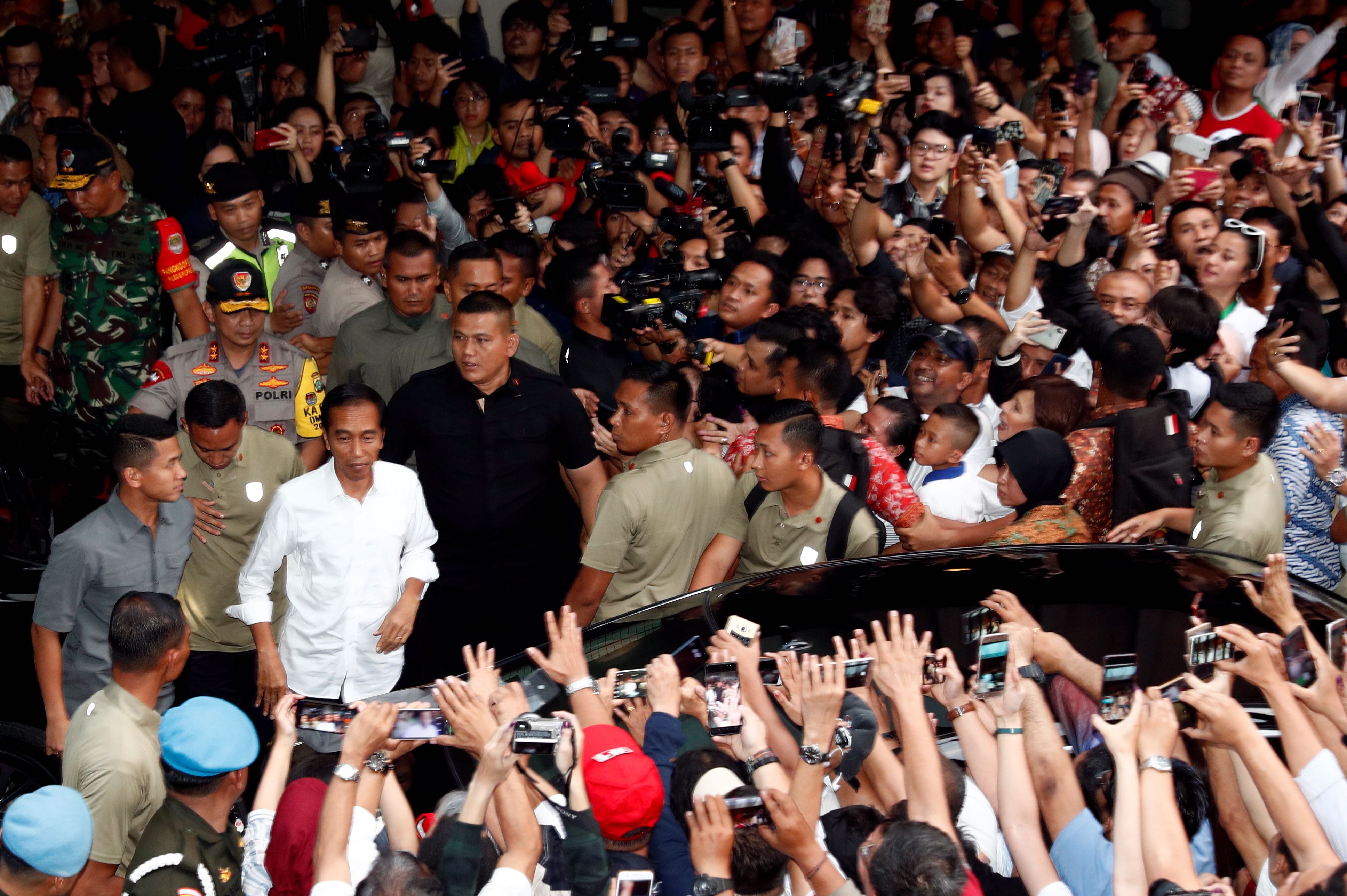 Indonesia's President Joko Widodo reacts after a quick count result during the Indonesian elections in Jakarta, Indonesia April 17, 2019. REUTERS/Edgar Su