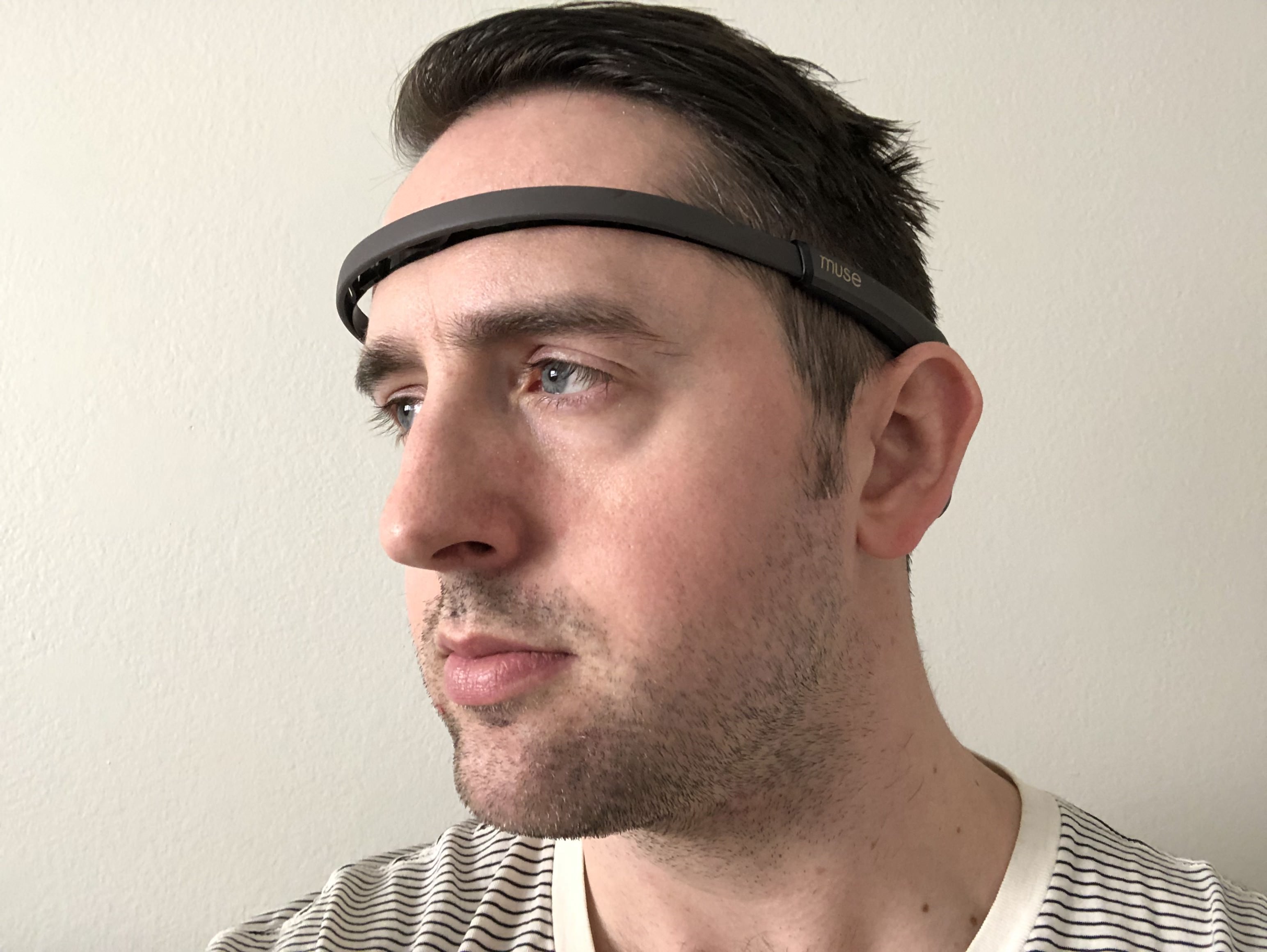 The author wearing an electronic headband that goes across his forehead.