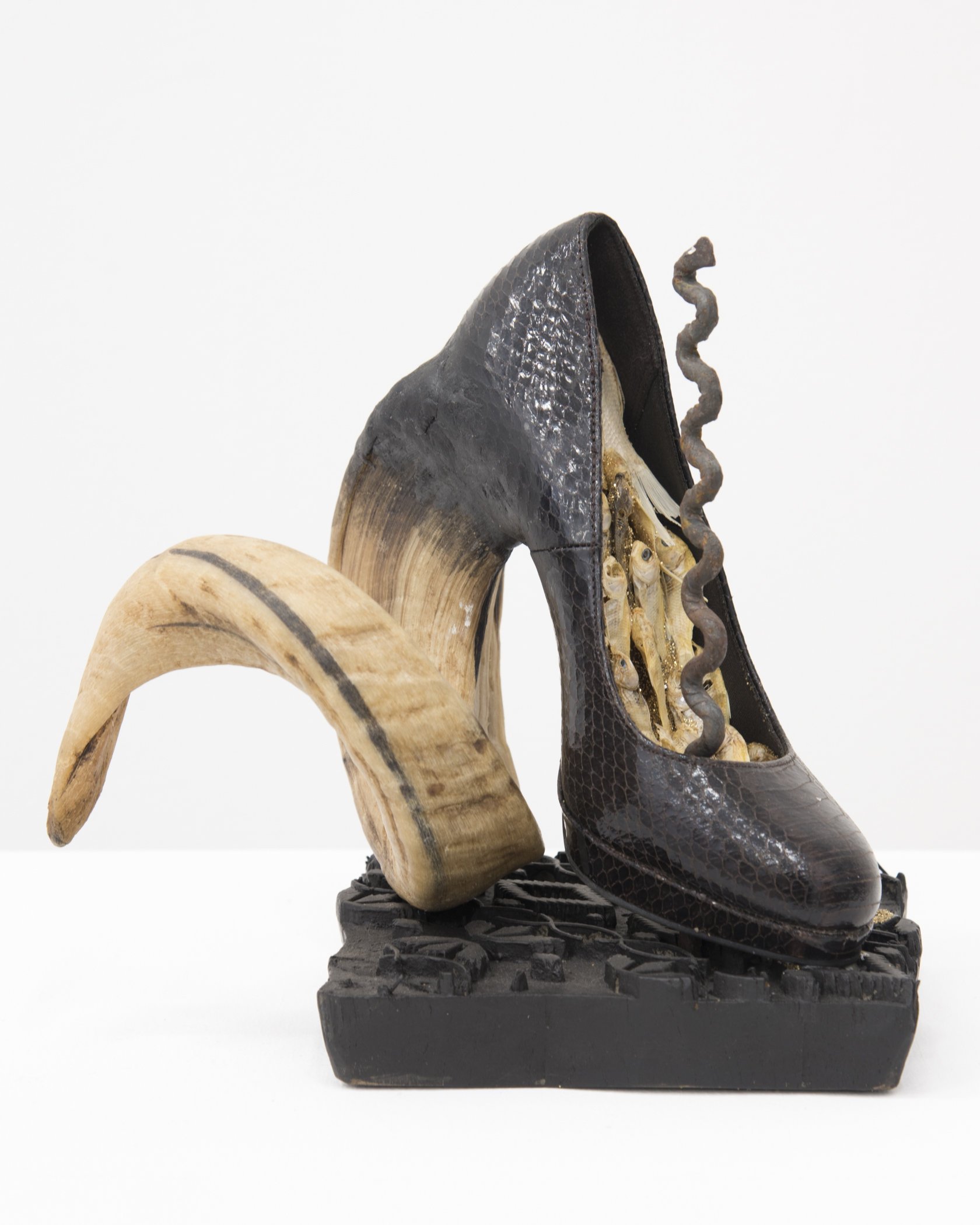 1556814159534-BREYER-P-ORRIDGE-Shoe-Horn-9-view-2-2016-Dominatrix-shoe-rams-horn-Vodun-iron-python-dried-feeder-fish-glitter-Nepalese-printing-block-9-1-2-x-9-5-8-x-6-1-2-in-241-x-244-x-165-cm-CNON-60758