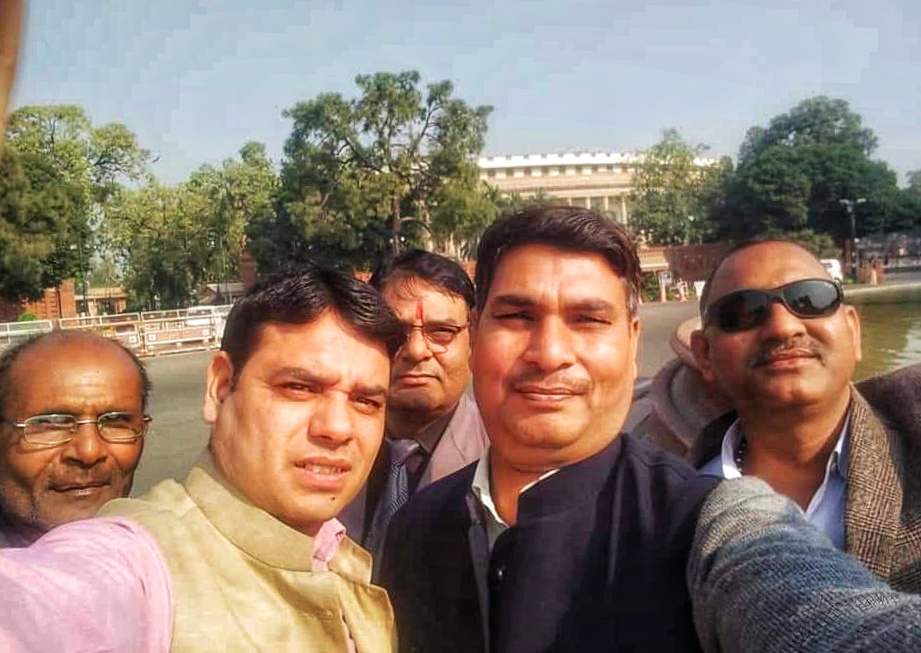 1557480436207-Amit-Sharma-centre-in-a-selfie-outside-Indian-Parliament-with-supporters