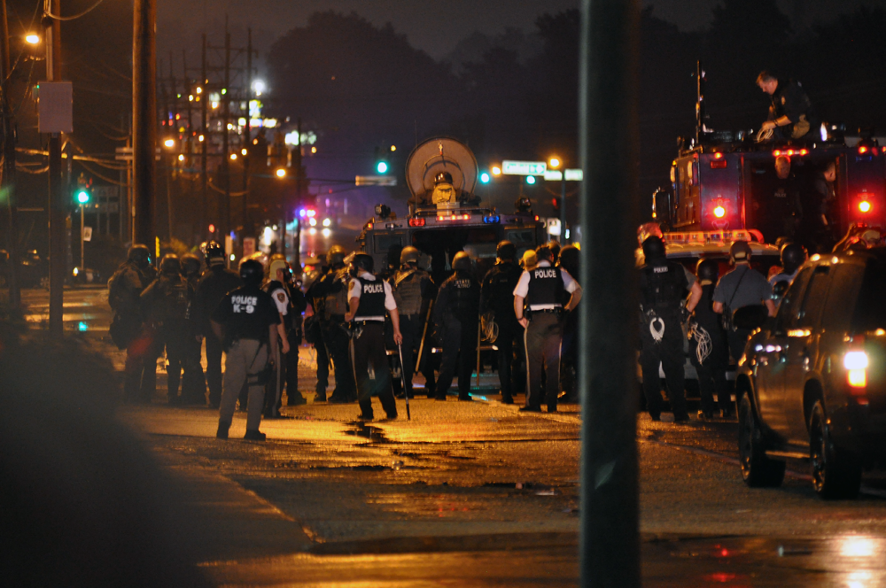 A photo from the Ferguson protests depicting armored police officers and vehicles.