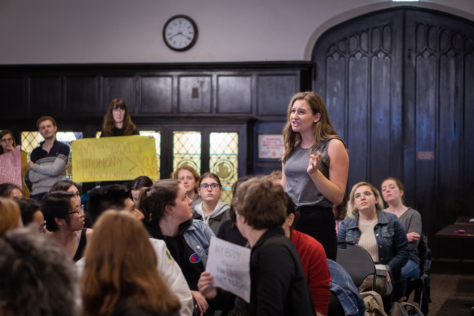 A student speaks during a student council debate over a resolution to restrict a fund for abortion