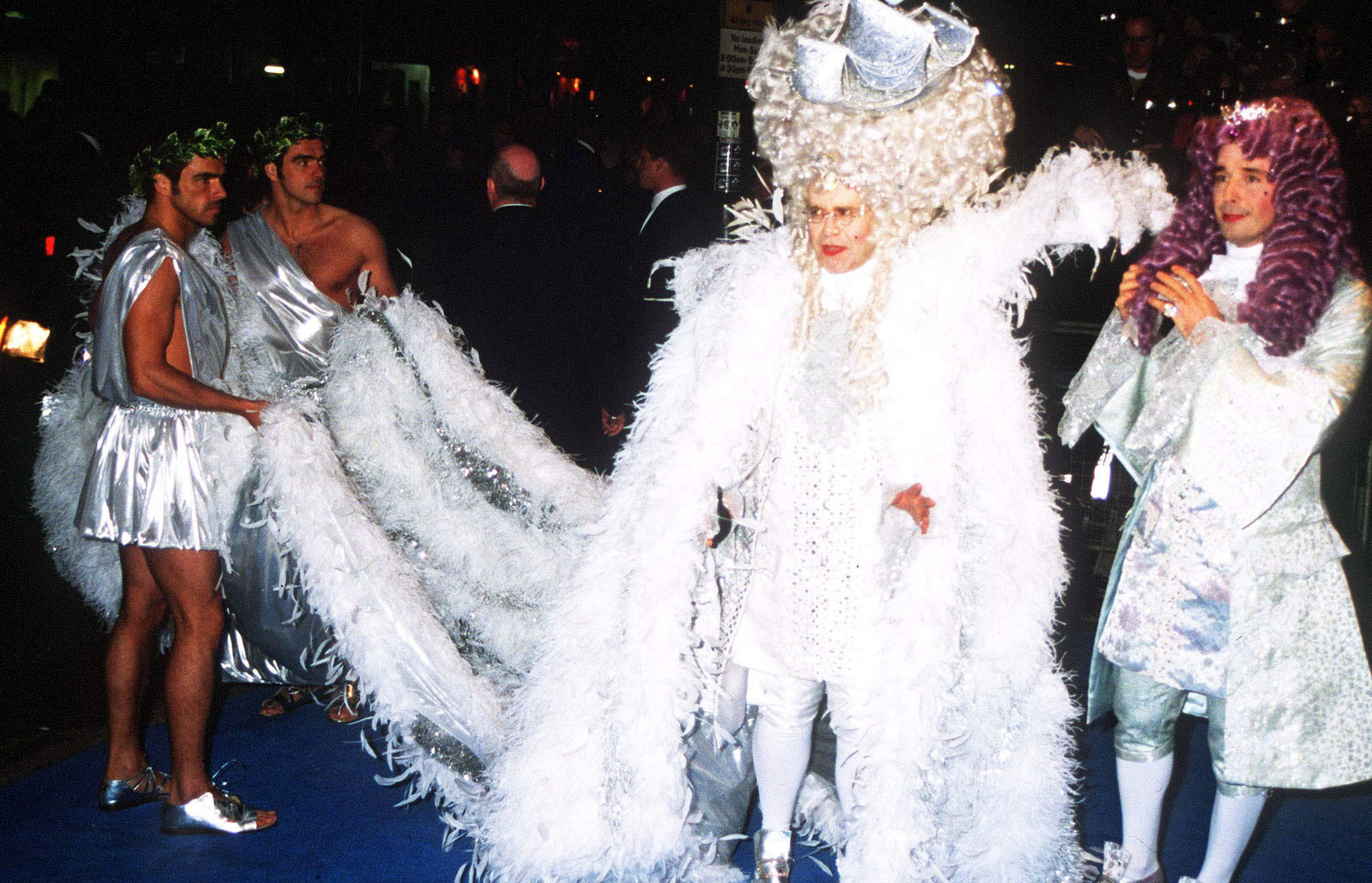 Photos: Elton John's Outfits Through the Years