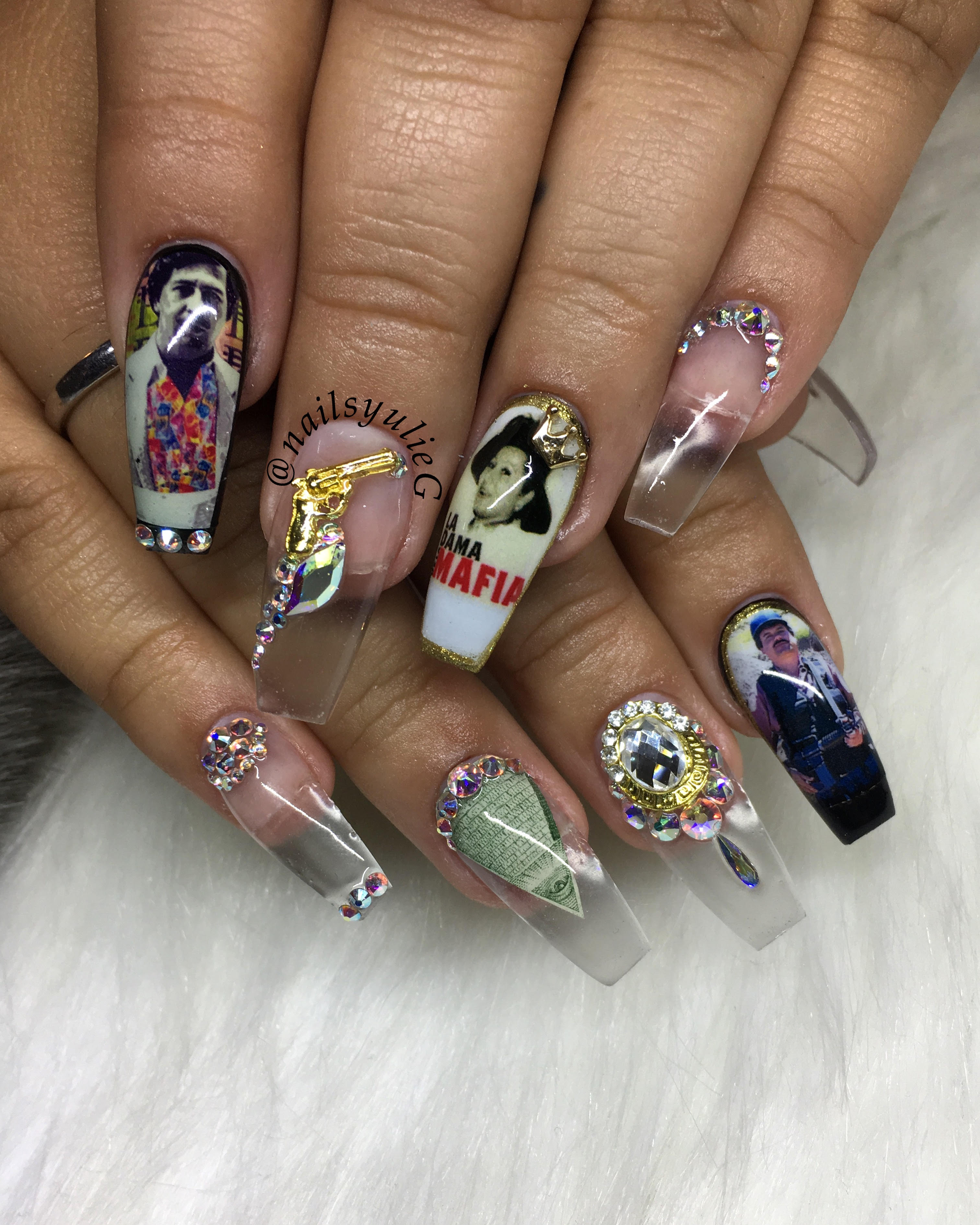 1560201228992-El-Chapo-nails-1