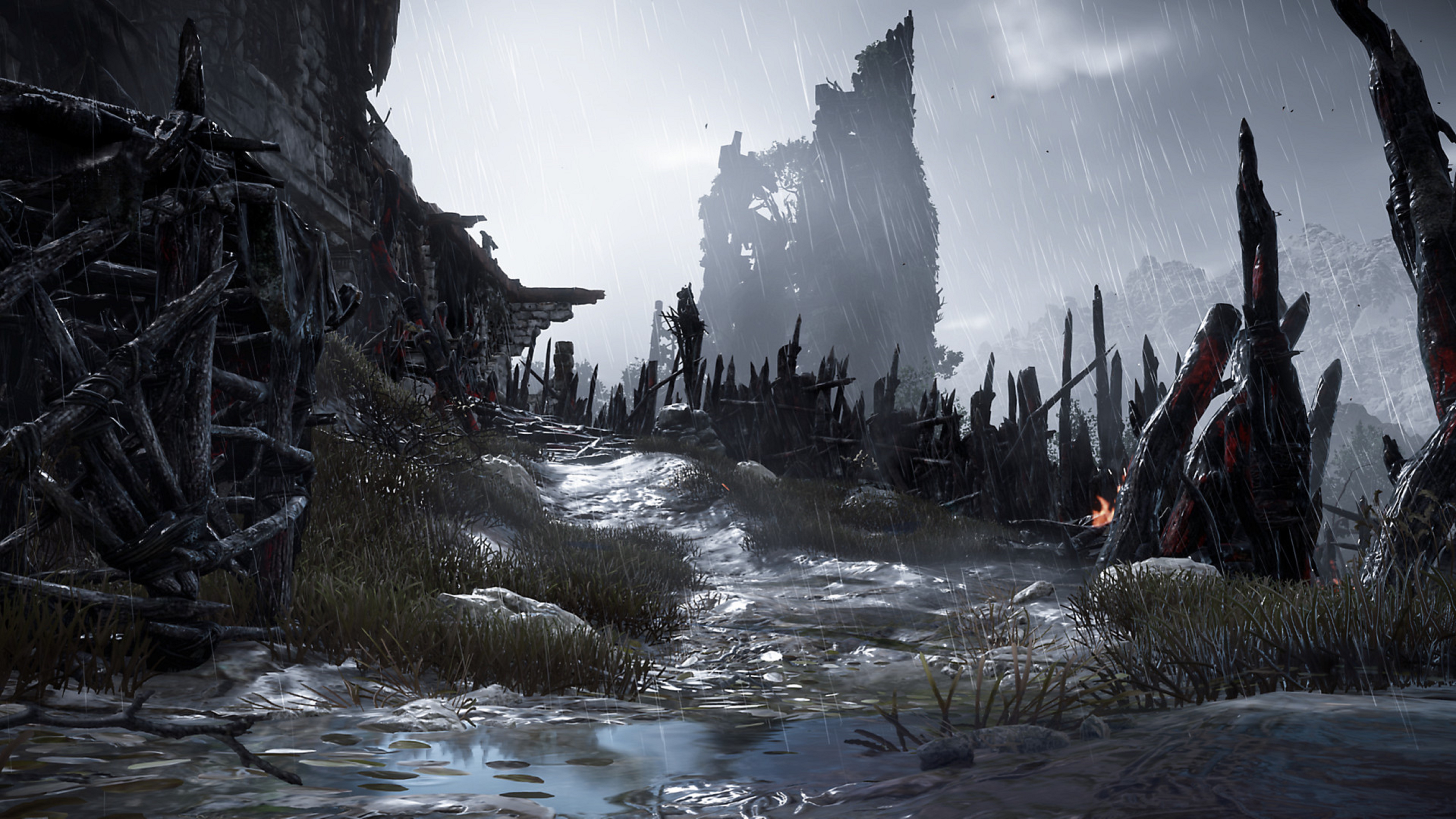 A rainy-soaked, ruined cityscape hundreds of years after an apparent collapse in Horizon, Zero Dawn.