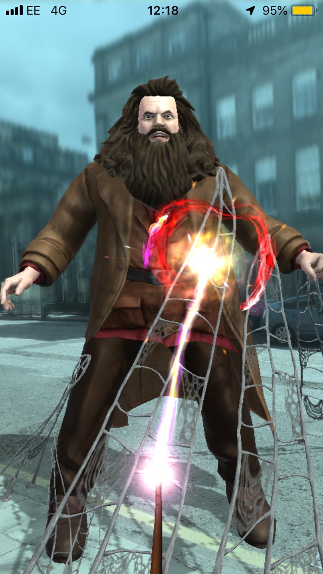 A rather uncanny-valley version of Hagrid gets blasted by a spell in Wizards Unite.