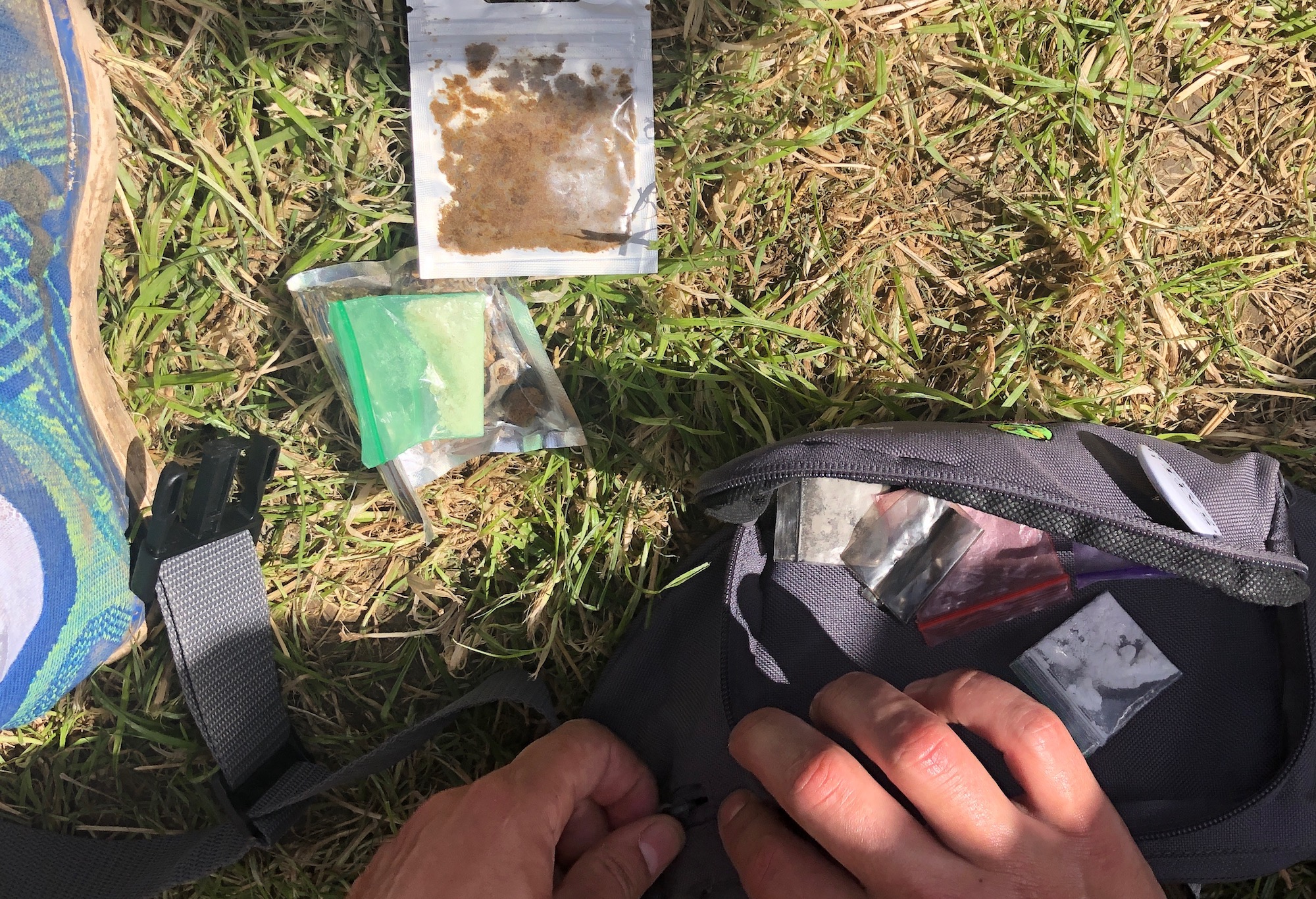 drugs laid out on grass